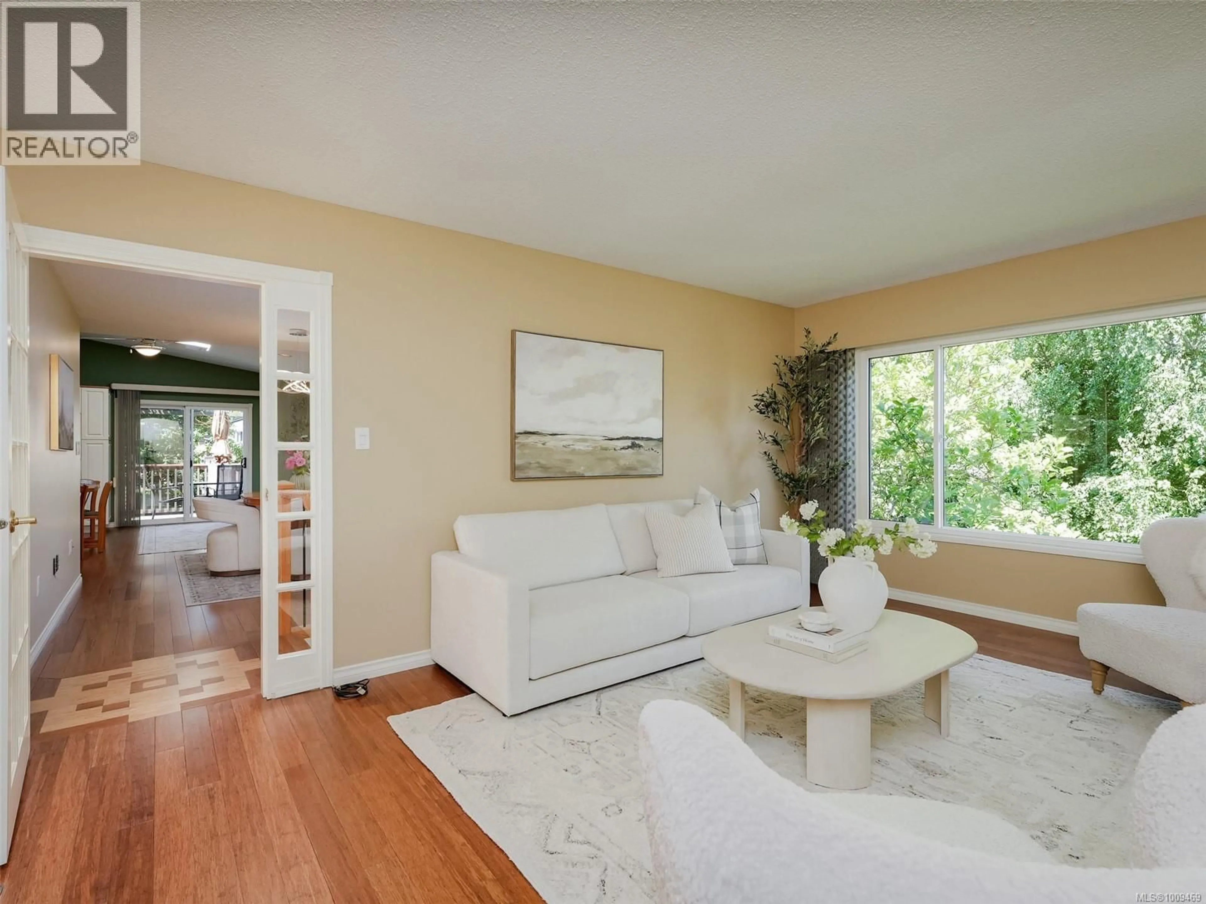Living room with furniture, unknown for 1869 PENSHURST ROAD, Saanich British Columbia V8N2P2