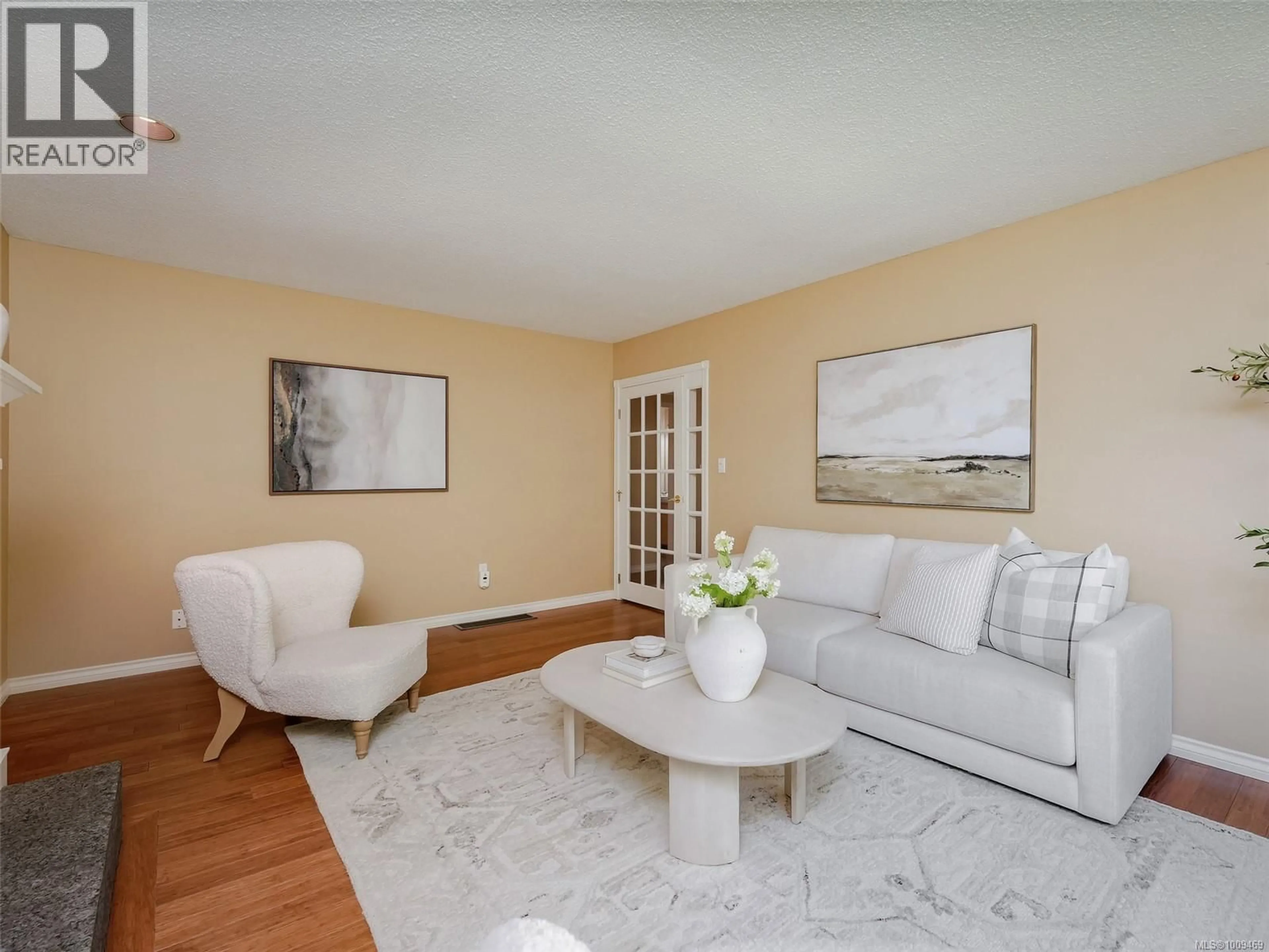 Living room with furniture, unknown for 1869 PENSHURST ROAD, Saanich British Columbia V8N2P2