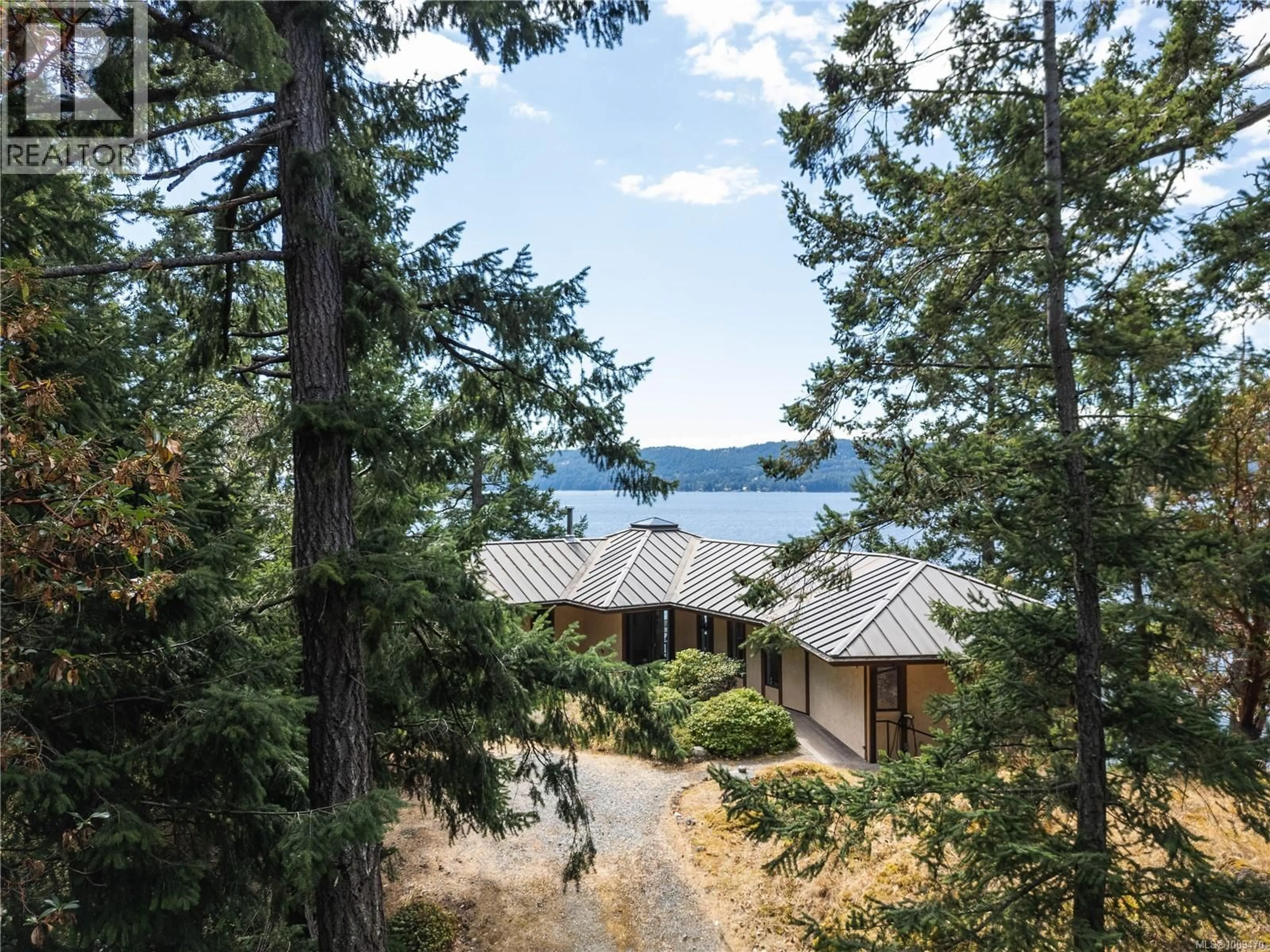 A pic from outside/outdoor area/front of a property/back of a property/a pic from drone, water/lake/river/ocean view for 456 SCOTT POINT DRIVE, Salt Spring British Columbia V8K2R2