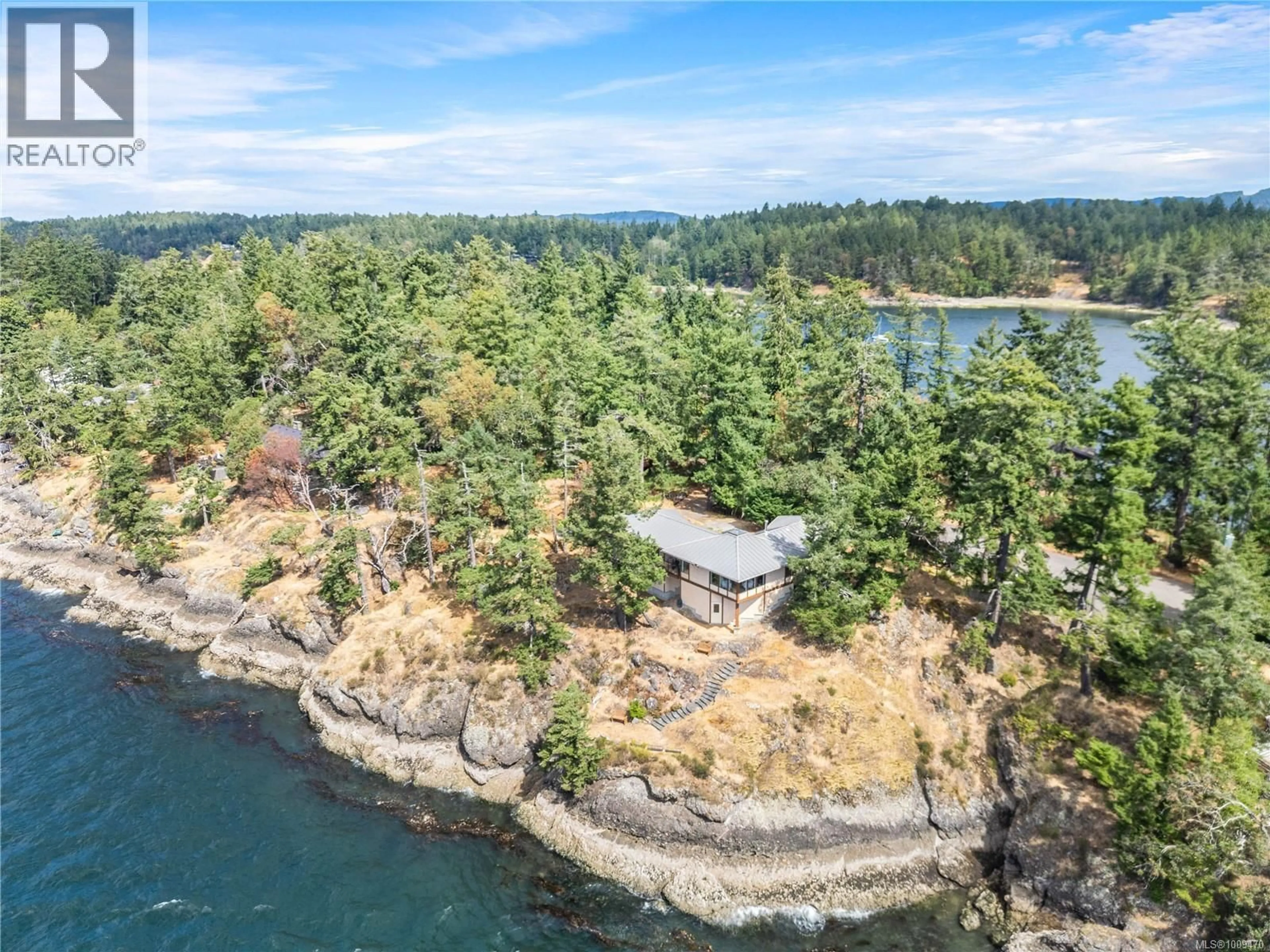 A pic from outside/outdoor area/front of a property/back of a property/a pic from drone, water/lake/river/ocean view for 456 SCOTT POINT DRIVE, Salt Spring British Columbia V8K2R2