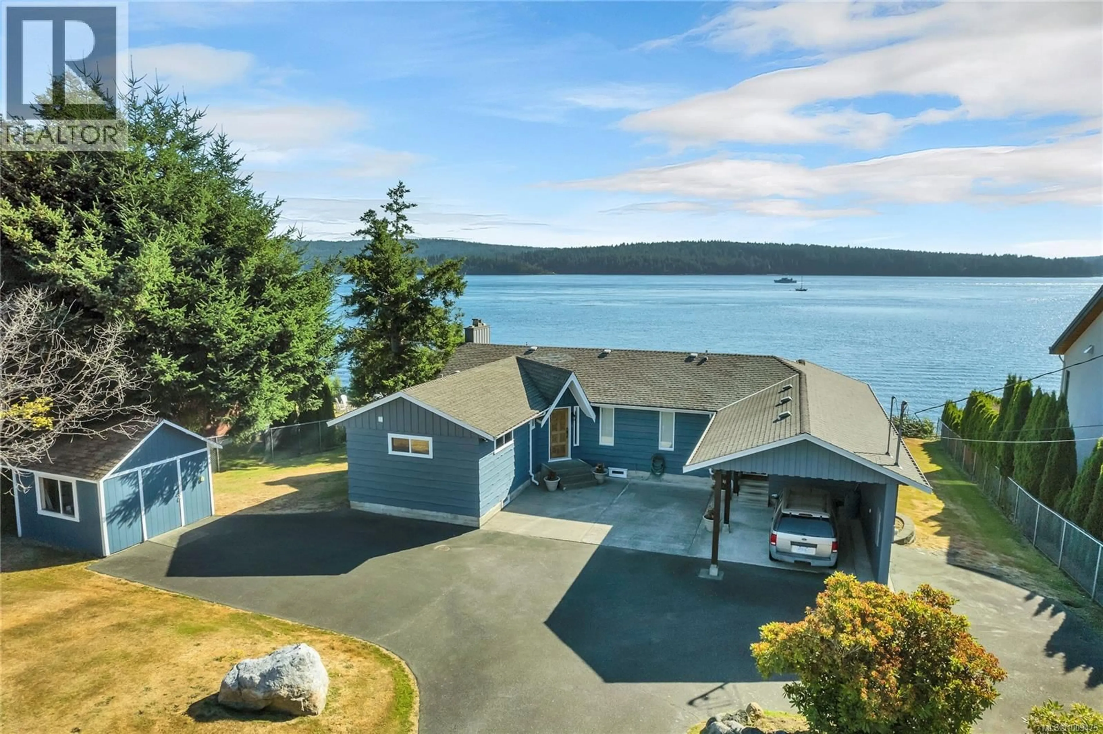 A pic from outside/outdoor area/front of a property/back of a property/a pic from drone, water/lake/river/ocean view for 4255 DISCOVERY DRIVE, Campbell River British Columbia V9W4X9