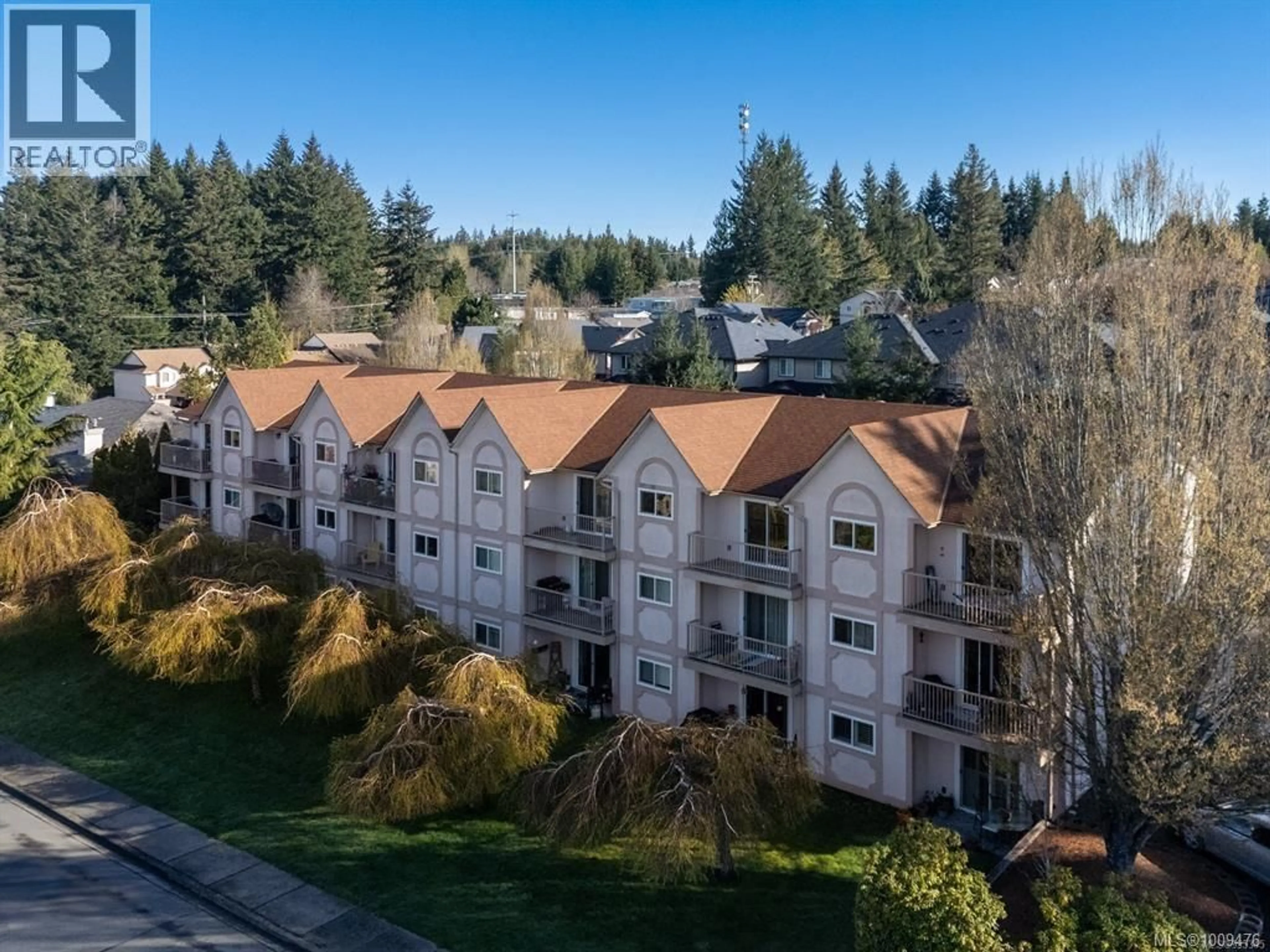 A pic from outside/outdoor area/front of a property/back of a property/a pic from drone, mountain view for 306 - 4692 ALDERWOOD PLACE, Courtenay British Columbia V9N9A1