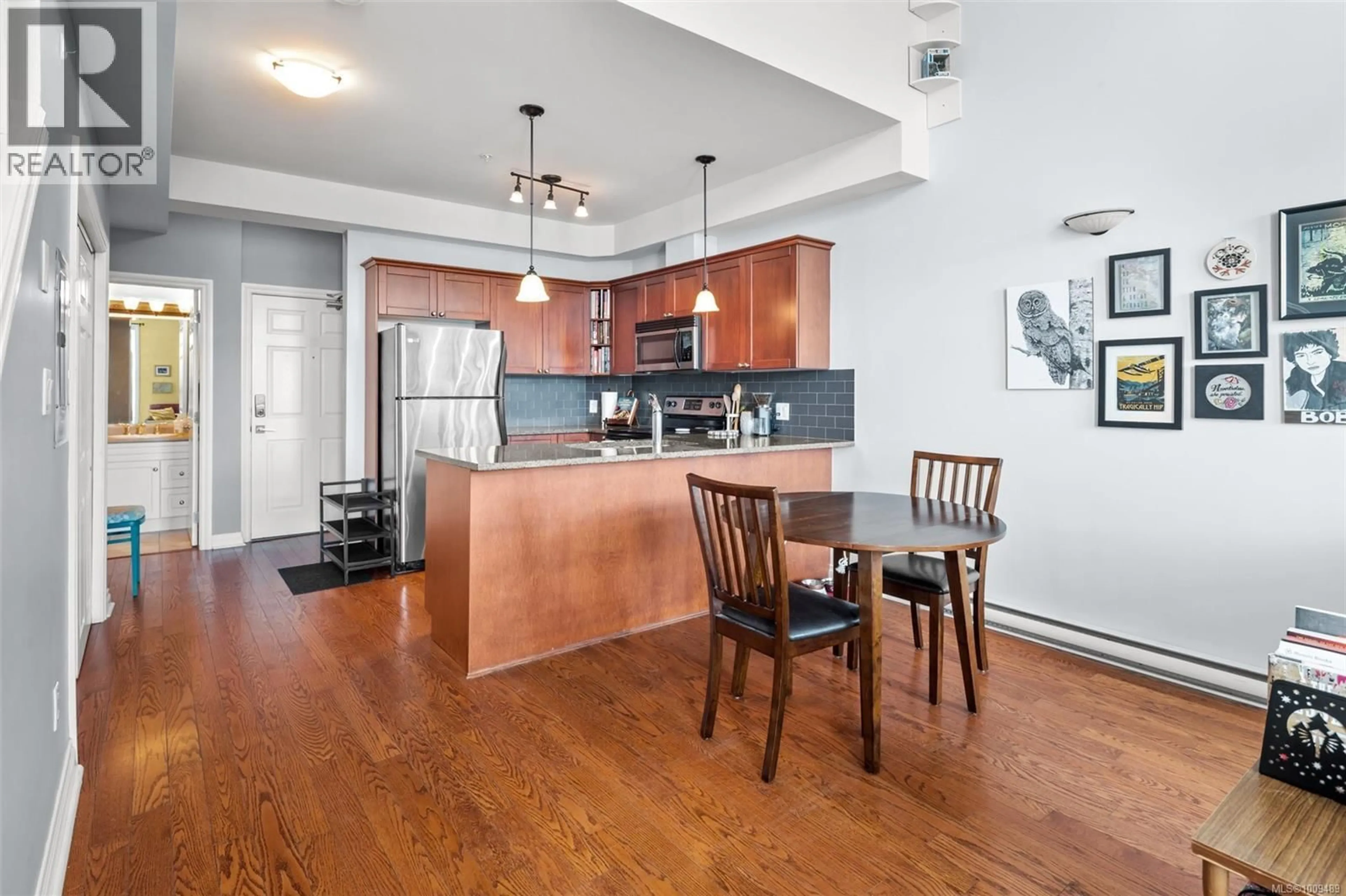 Open concept kitchen, wood/laminate floor for 418 - 866 GOLDSTREAM AVENUE, Langford British Columbia V9B2X9