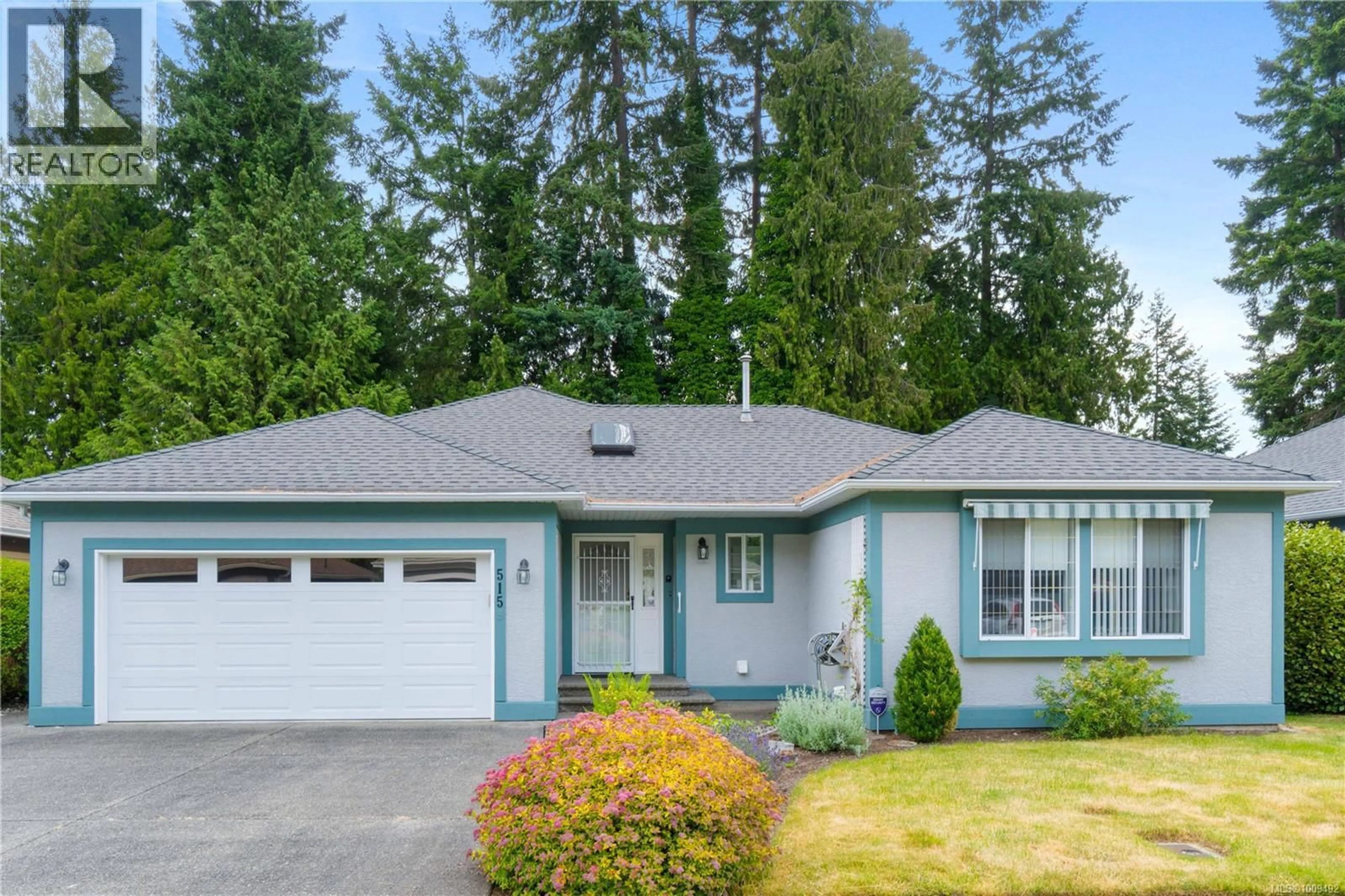 Home with vinyl exterior material, street for 515 SEAWARD WAY, Qualicum Beach British Columbia V9K1T8