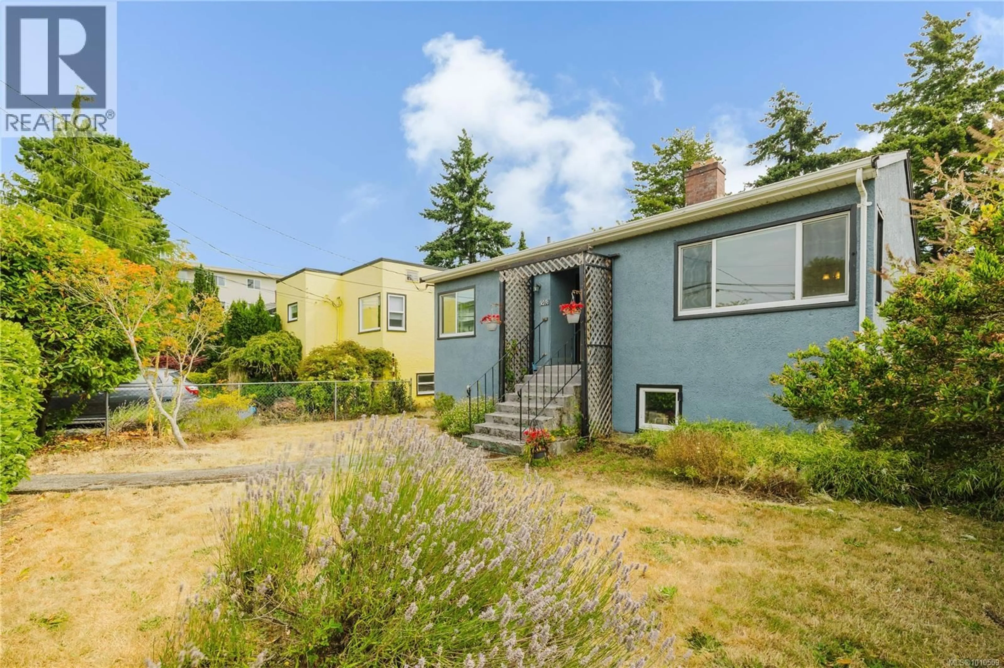 Home with vinyl exterior material, street for 1905 LEE AVENUE, Victoria British Columbia V8R4W9