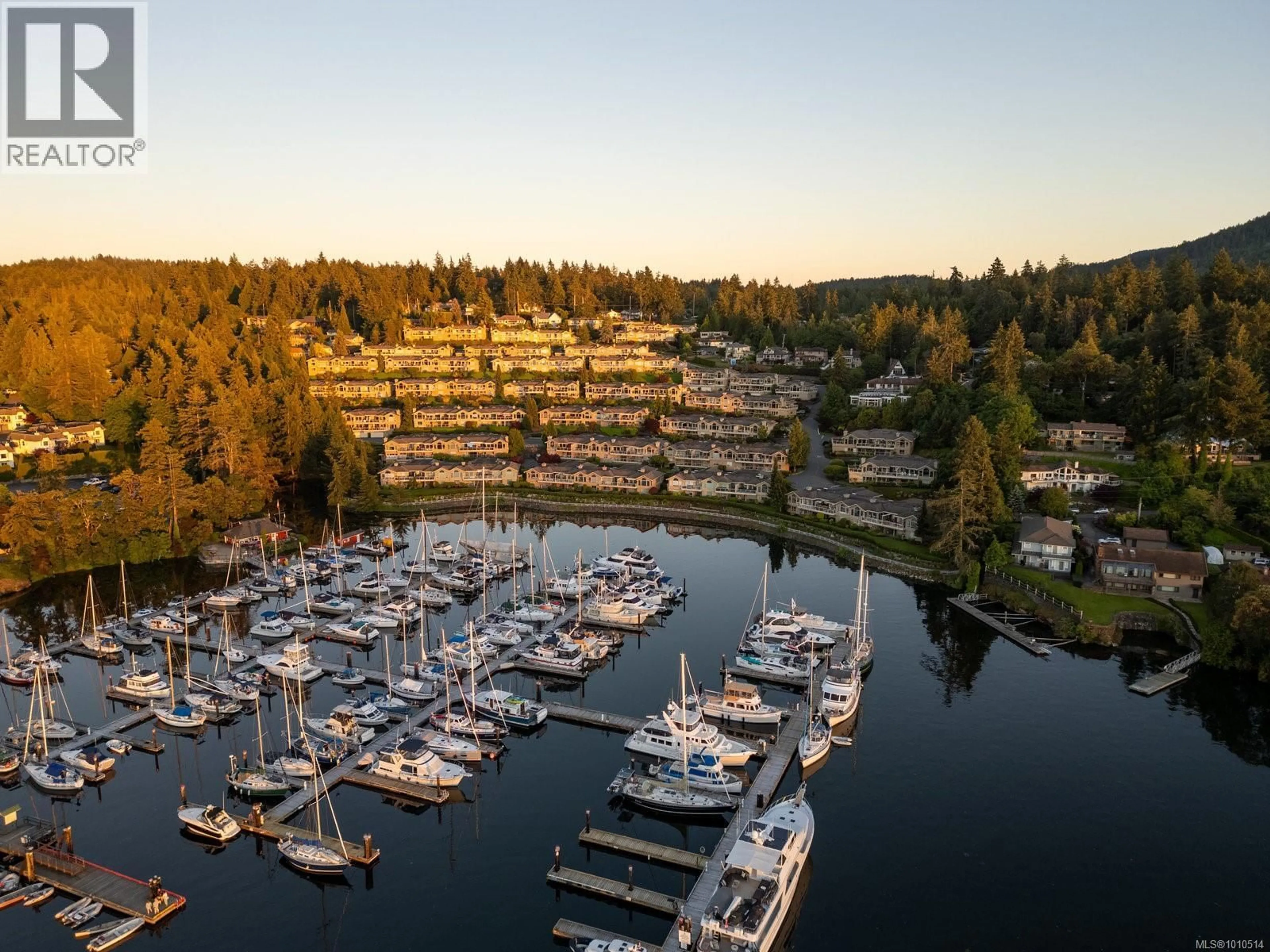 A pic from outside/outdoor area/front of a property/back of a property/a pic from drone, water/lake/river/ocean view for 927 - 6880 WALLACE DRIVE, Central Saanich British Columbia V8M1N8