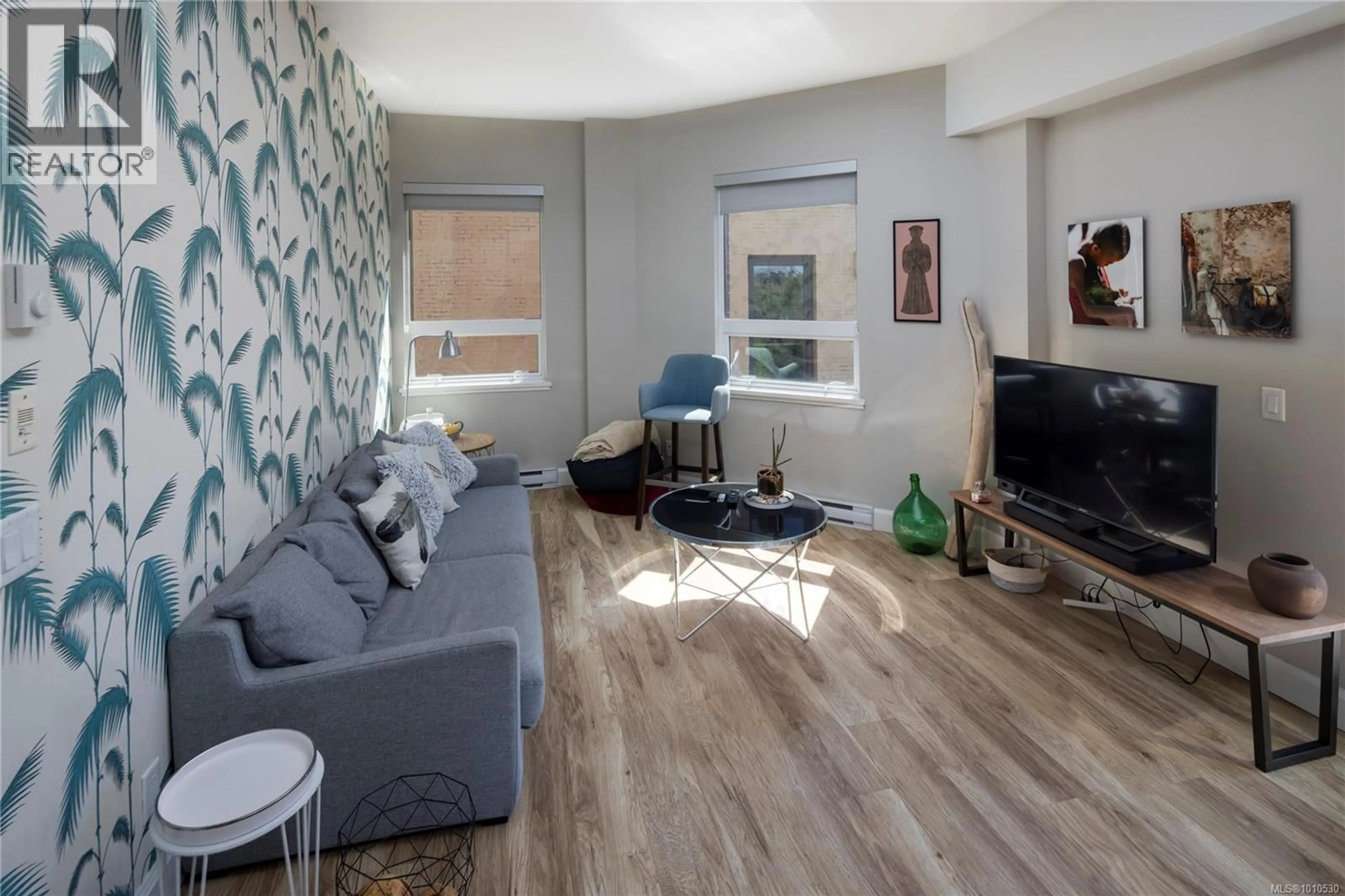 Living room with furniture, unknown for 307 - 595 PANDORA AVENUE, Victoria British Columbia V8W1N5