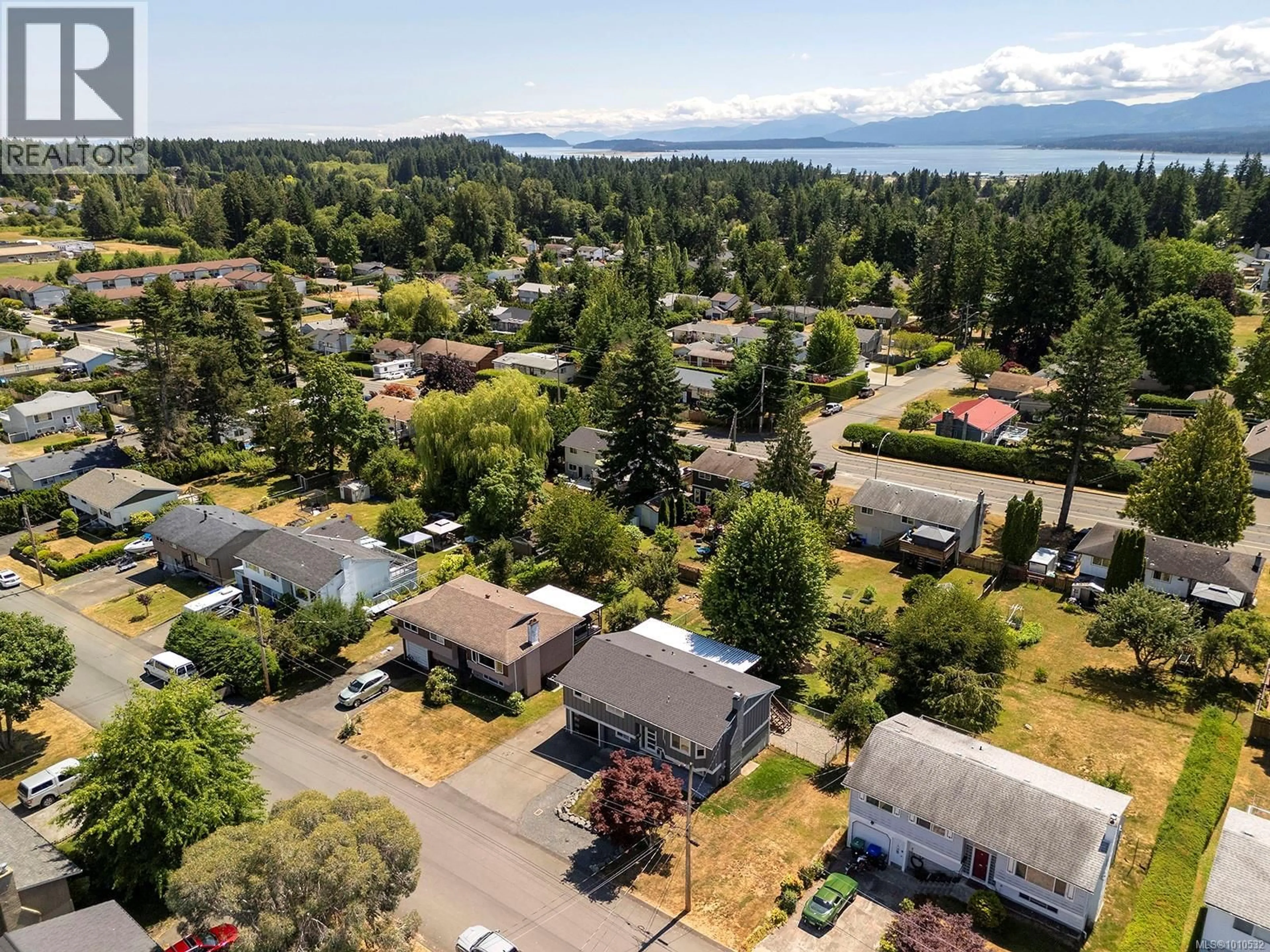 A pic from outside/outdoor area/front of a property/back of a property/a pic from drone, unknown for 1643 TSIMSHIAN AVENUE, Comox British Columbia V9M2M4