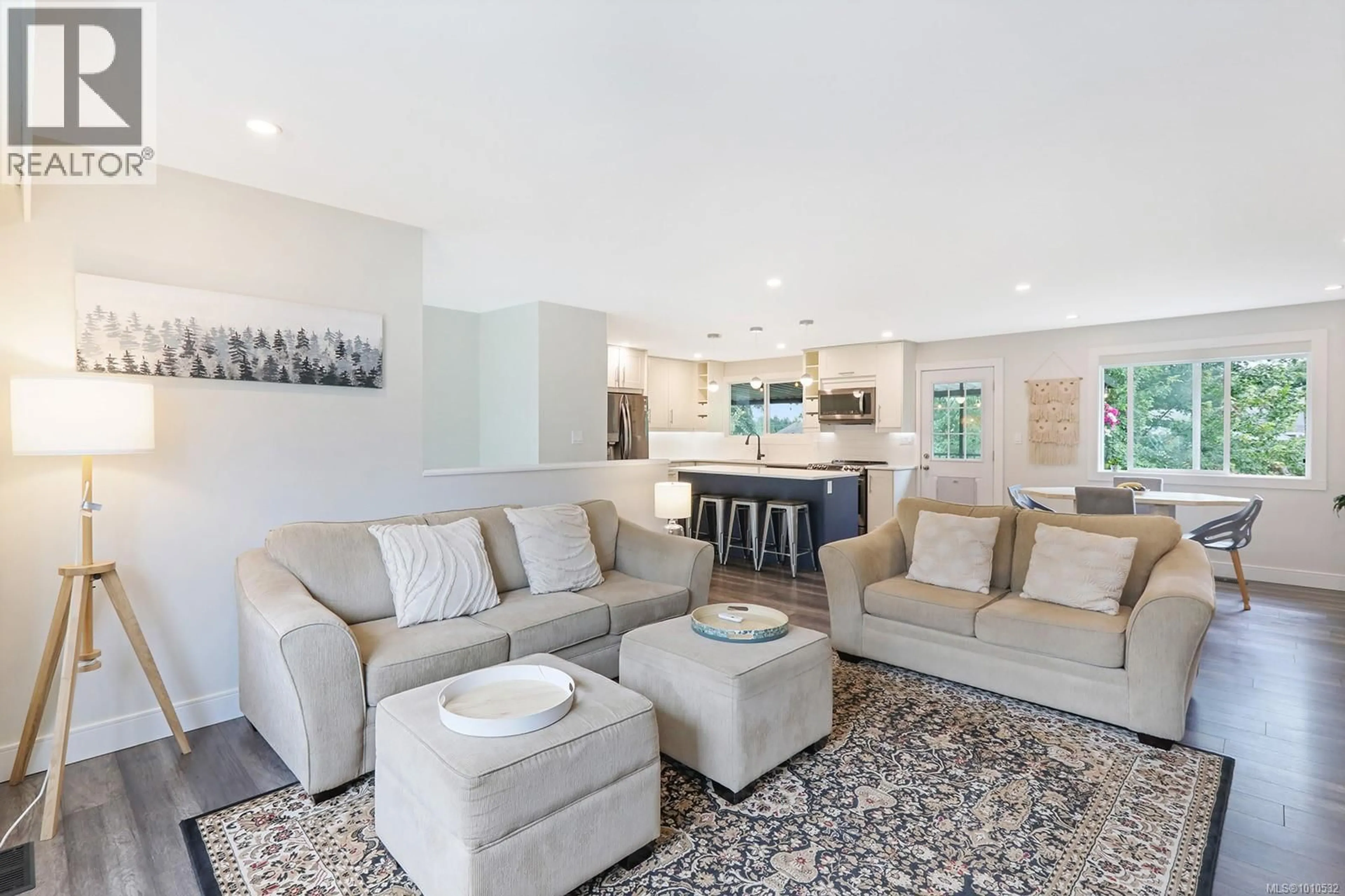 Living room with furniture, ceramic/tile floor for 1643 TSIMSHIAN AVENUE, Comox British Columbia V9M2M4