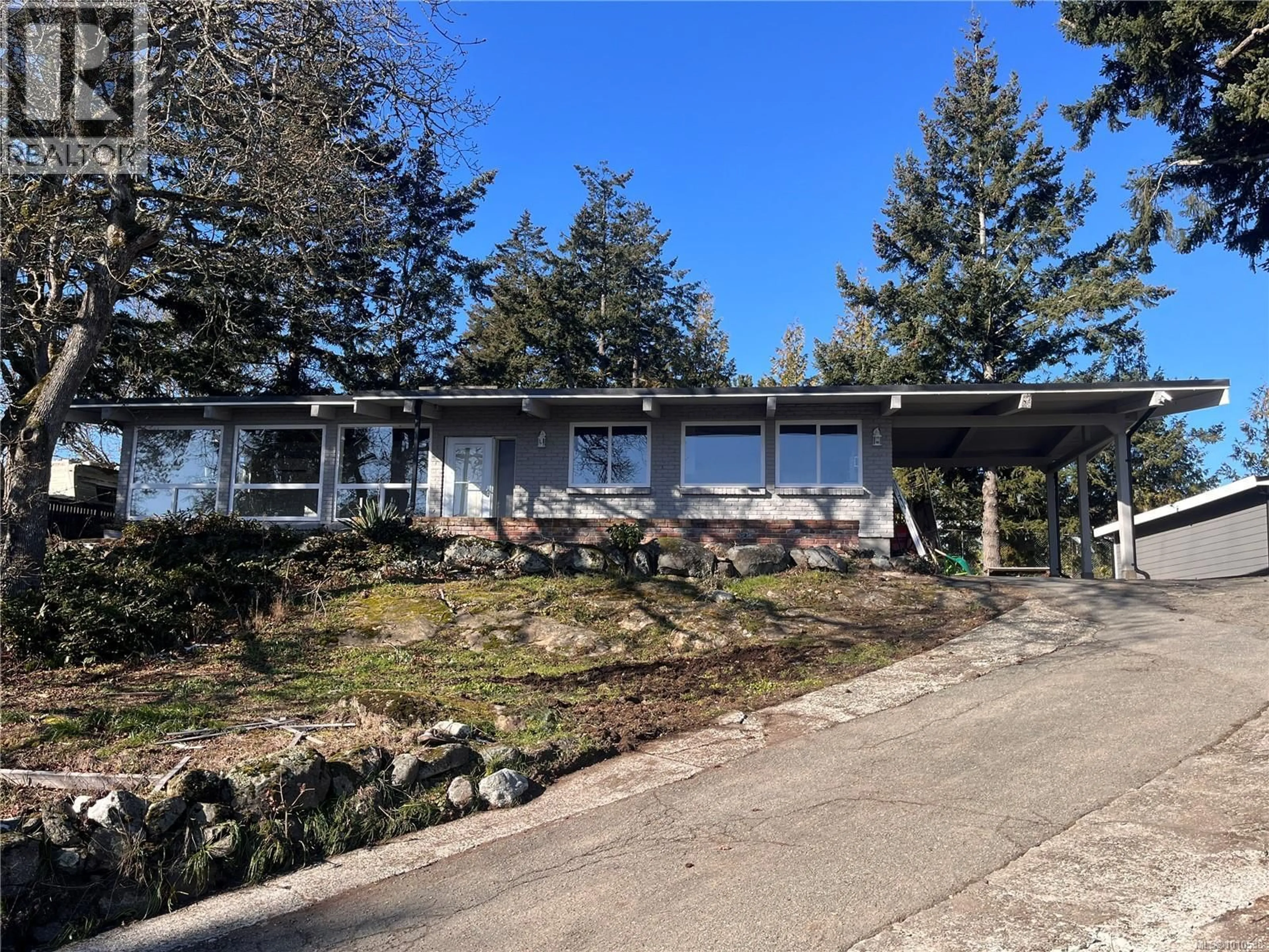 A pic from outside/outdoor area/front of a property/back of a property/a pic from drone, street for 107 ISLAND HIGHWAY, View Royal British Columbia V9B1G1