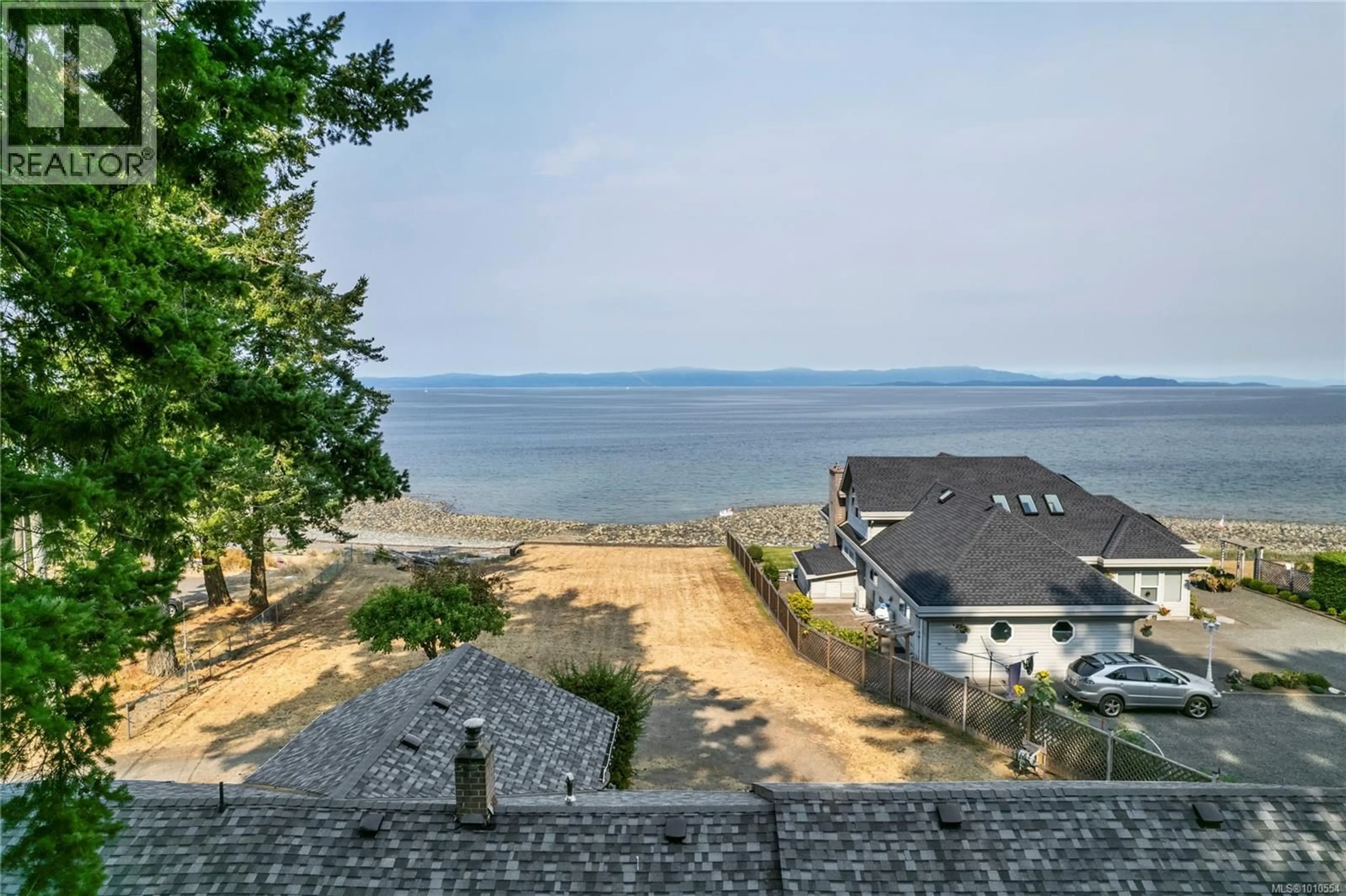A pic from outside/outdoor area/front of a property/back of a property/a pic from drone, water/lake/river/ocean view for 35 BOWSER ROAD, Bowser British Columbia V0R1G0