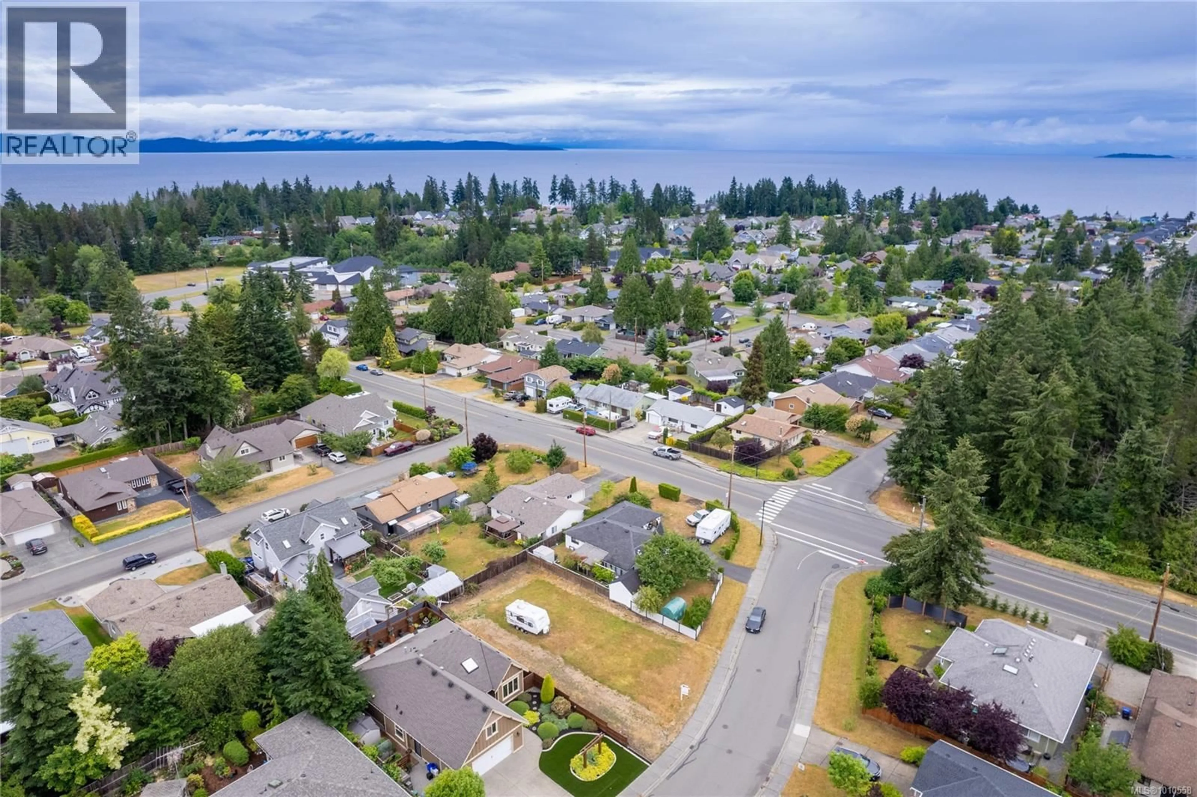 A pic from outside/outdoor area/front of a property/back of a property/a pic from drone, water/lake/river/ocean view for 715 DOEHLE AVENUE, Parksville British Columbia V9P2V1