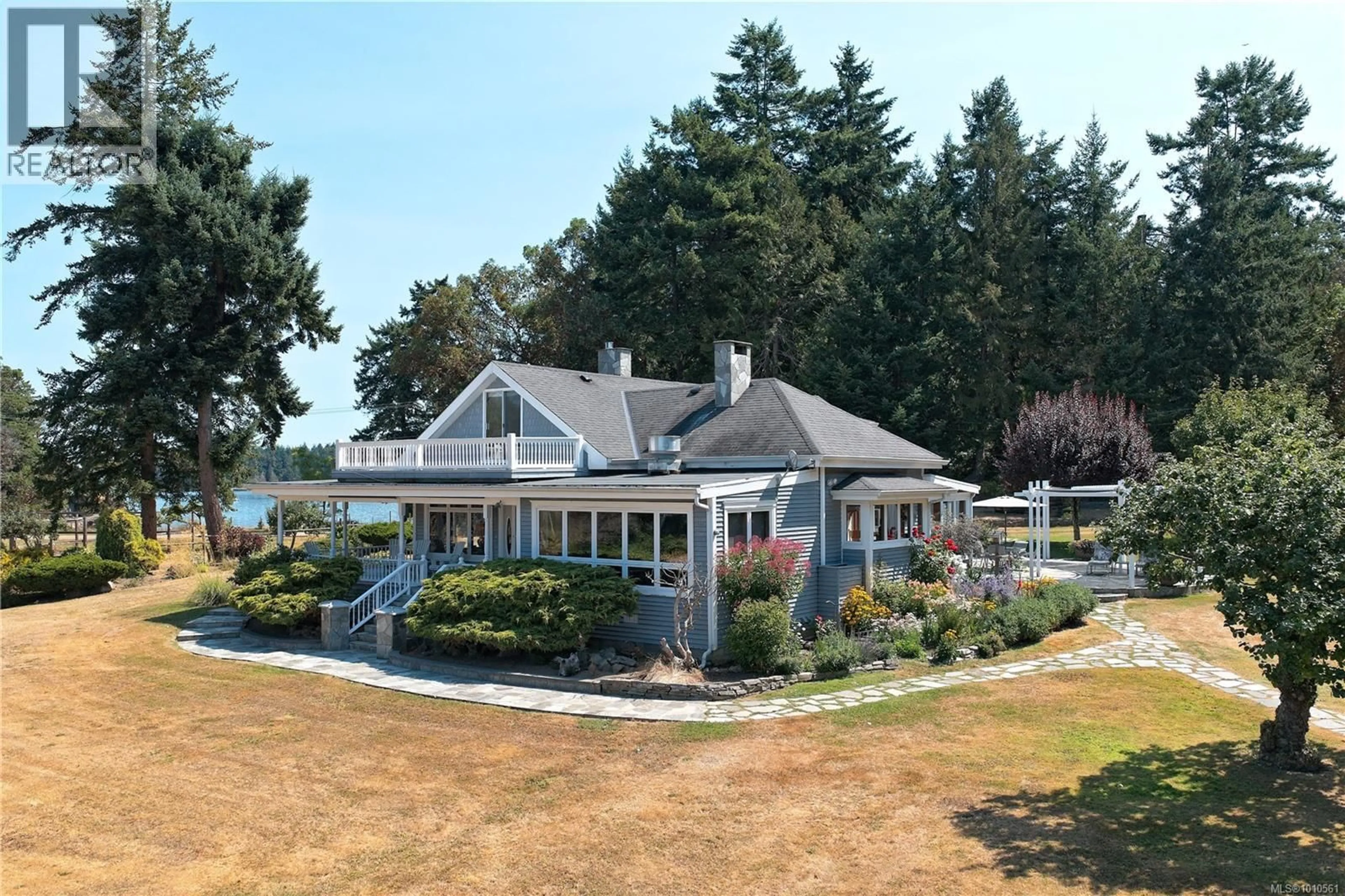 A pic from outside/outdoor area/front of a property/back of a property/a pic from drone, water/lake/river/ocean view for 101 CHURCH BAY ROAD, Saturna Island British Columbia V0N2Y0