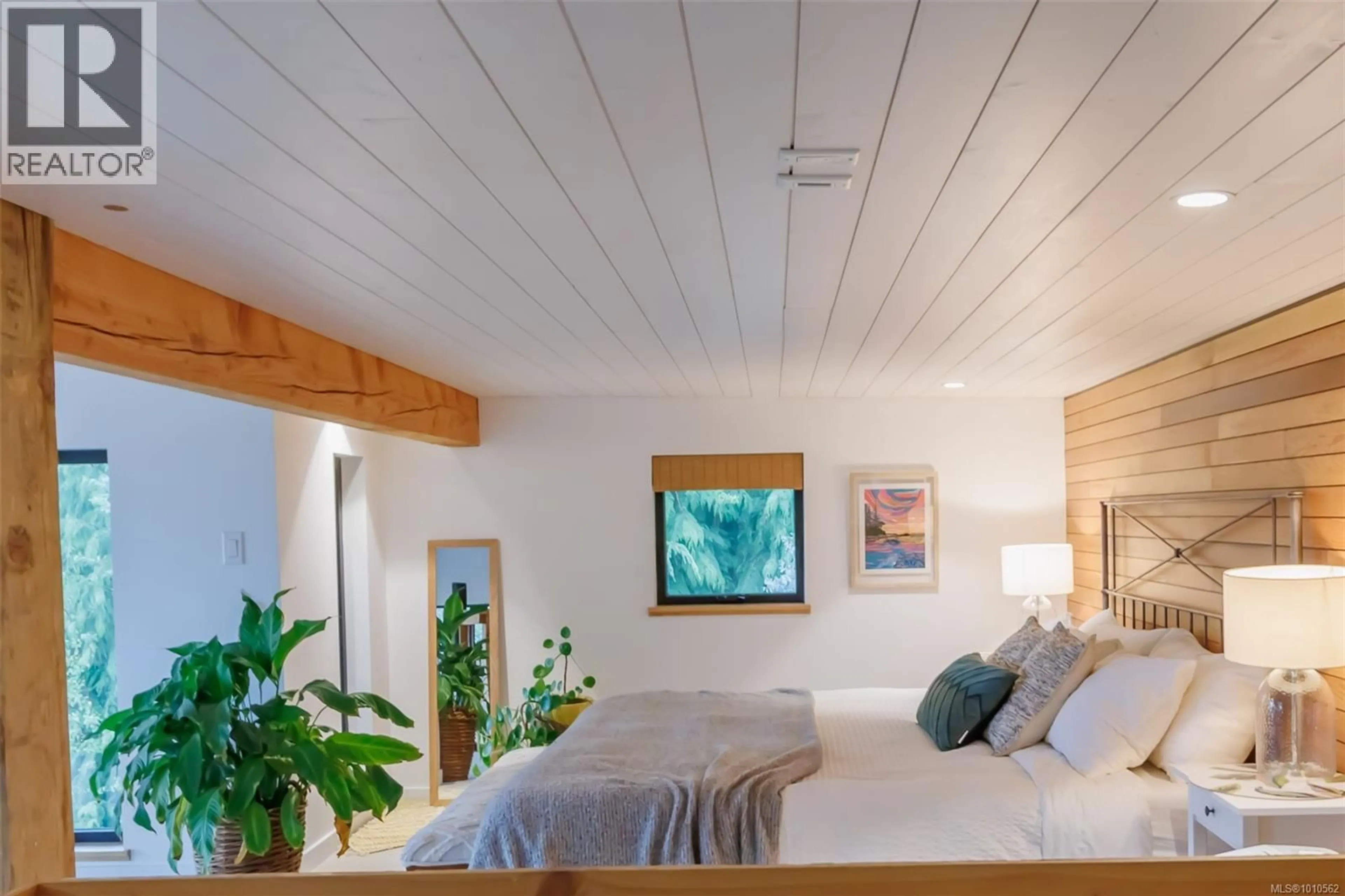 Bedroom with bed, wood/laminate floor for 3972 TRAILHEAD ROAD, Sooke British Columbia V9Z1L1