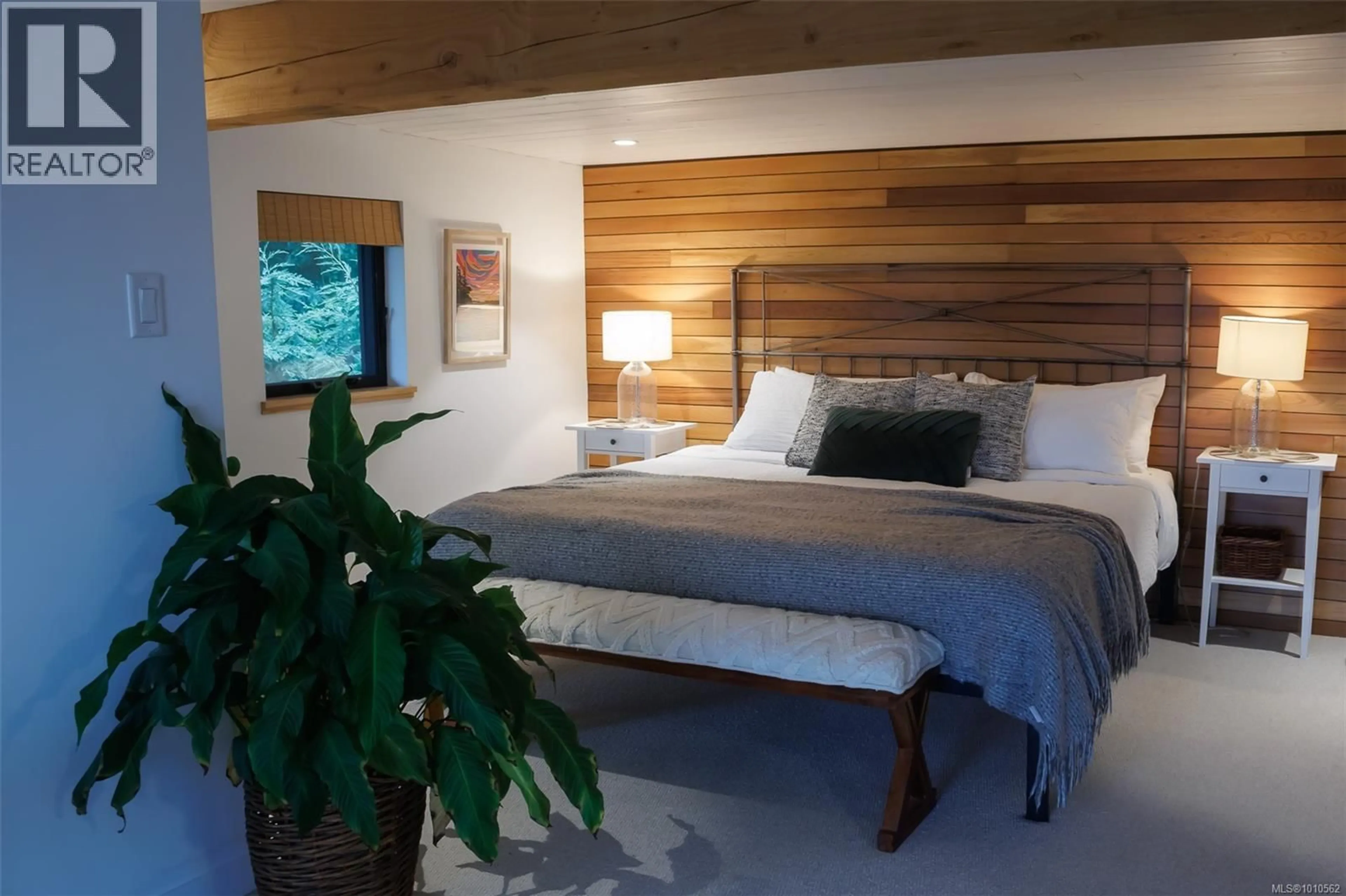 Bedroom with bed, wood/laminate floor for 3972 TRAILHEAD ROAD, Sooke British Columbia V9Z1L1