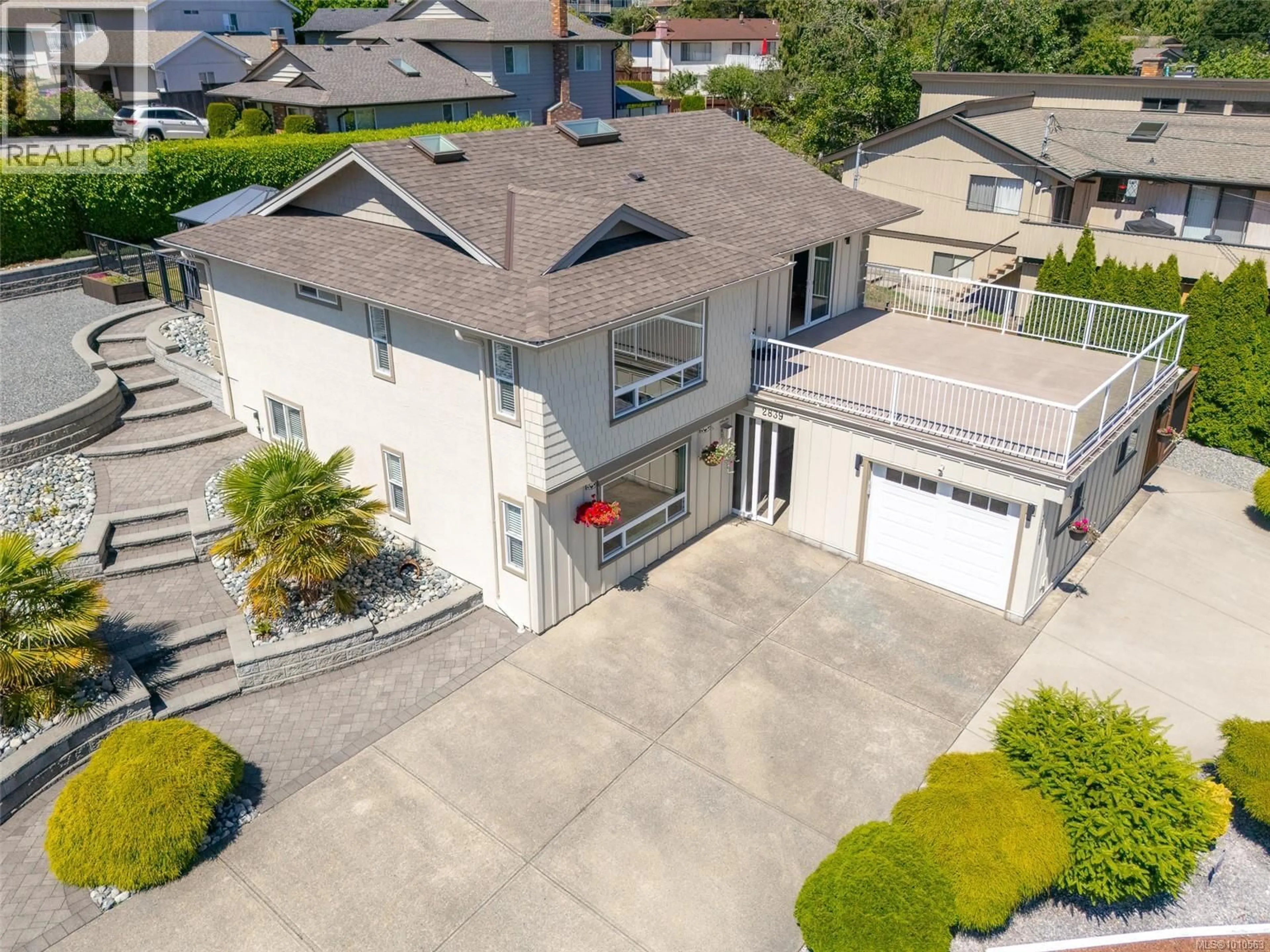 A pic from outside/outdoor area/front of a property/back of a property/a pic from drone, street for 2839 NEYLAND ROAD, Nanaimo British Columbia V9T3G2