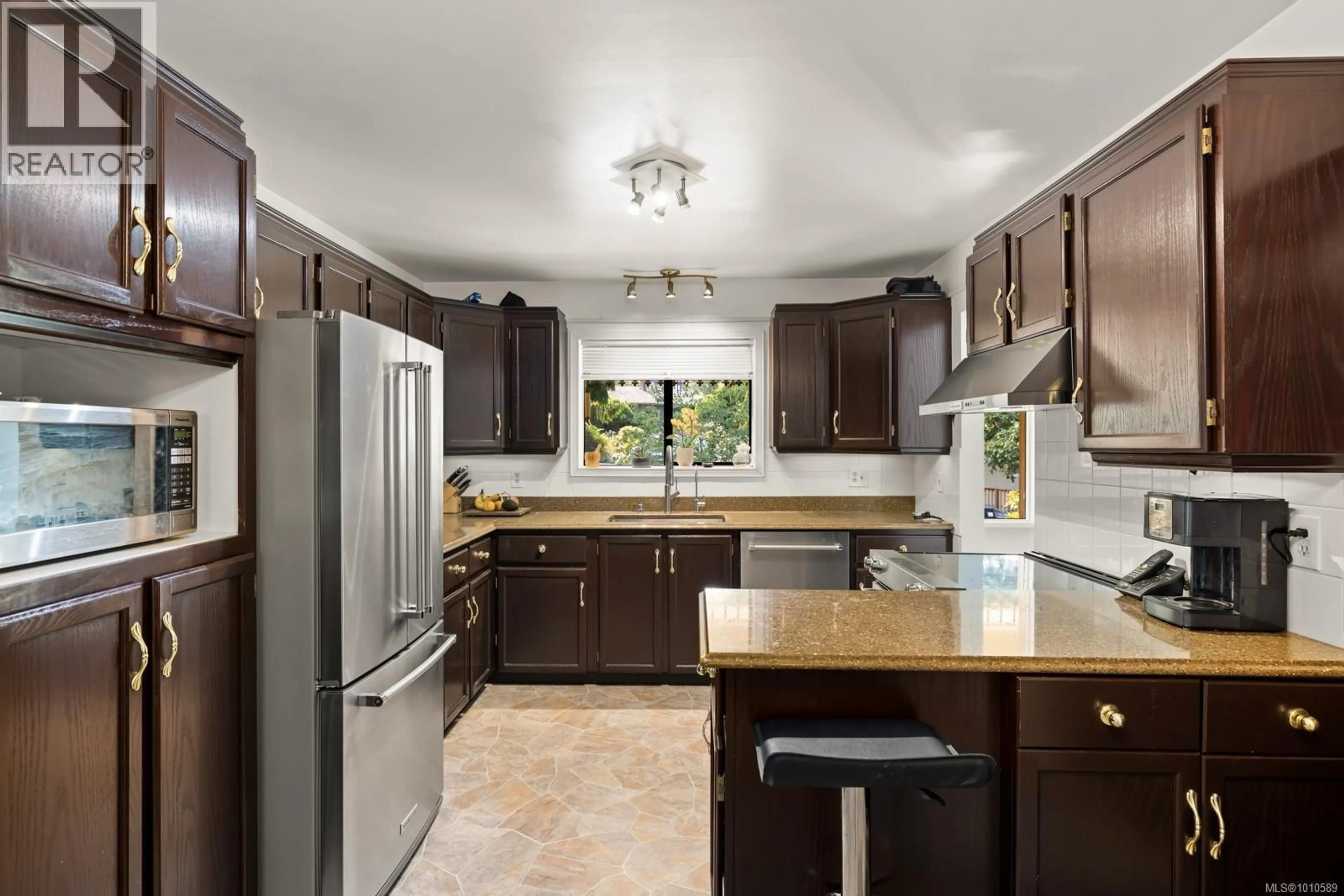 Open concept kitchen, ceramic/tile floor for 3361 ST. TROY PLACE, Colwood British Columbia V9C3J3
