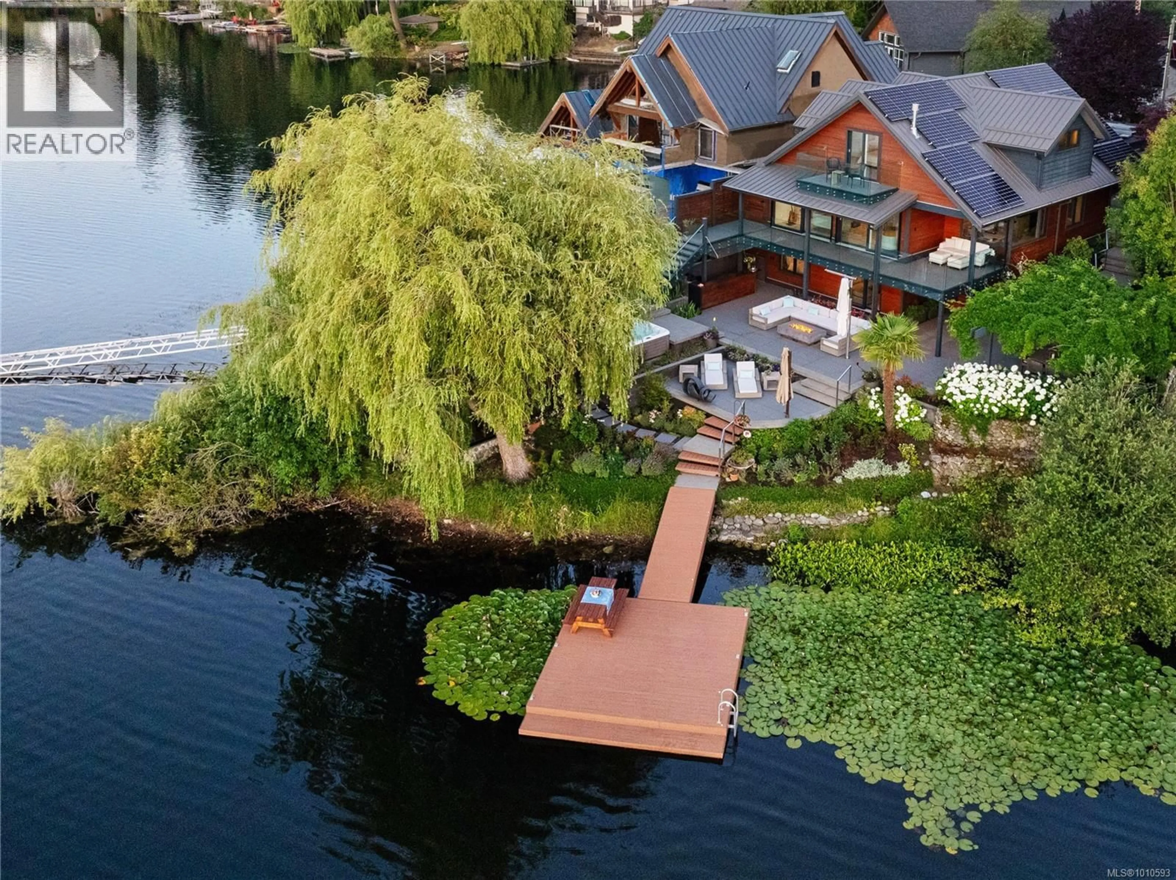 A pic from outside/outdoor area/front of a property/back of a property/a pic from drone, water/lake/river/ocean view for 1069 TRILLIUM ROAD, Langford British Columbia V9B4G3