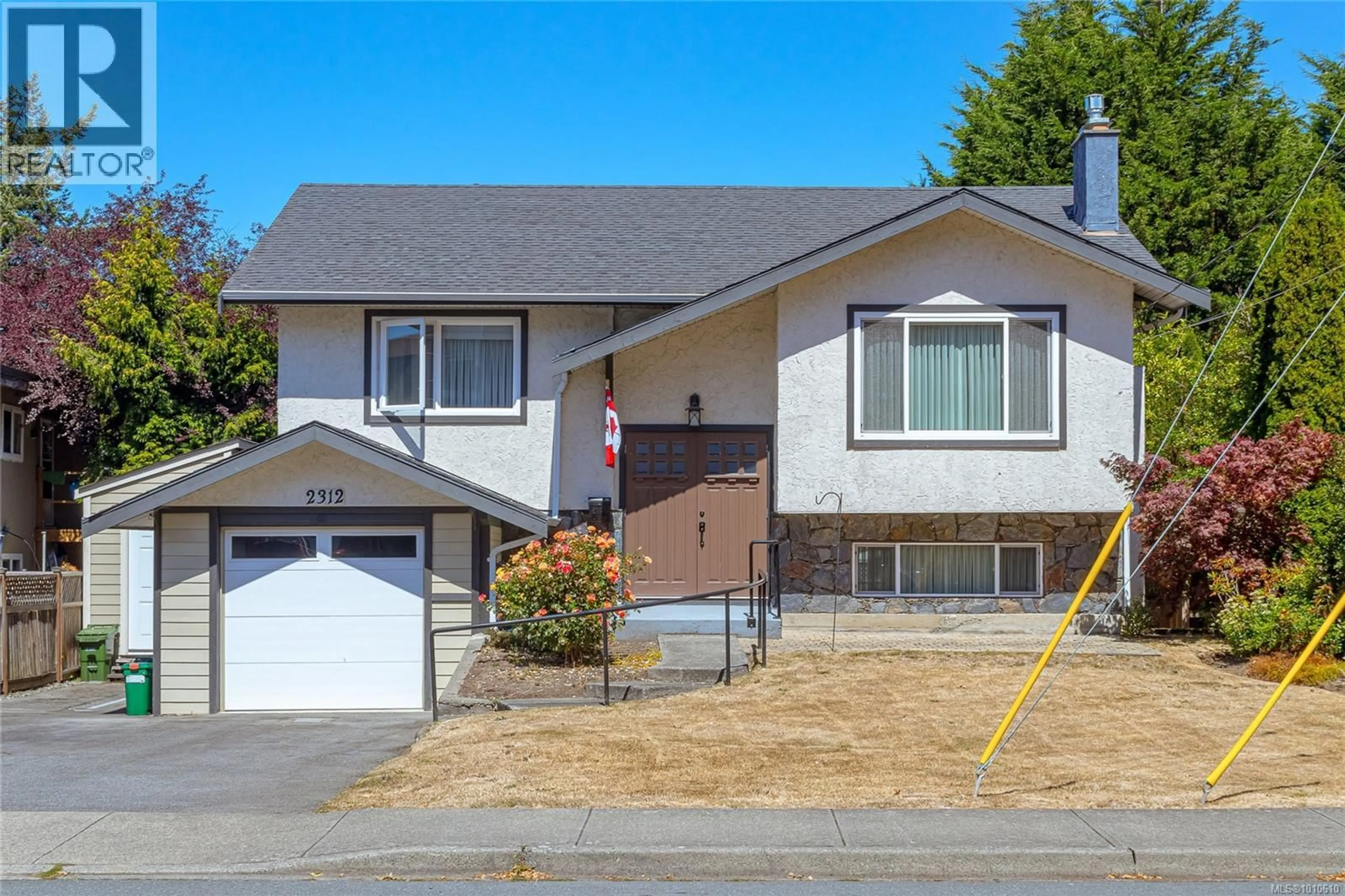 Home with vinyl exterior material, street for 2312 BRETHOUR AVENUE, Sidney British Columbia V8L2A3