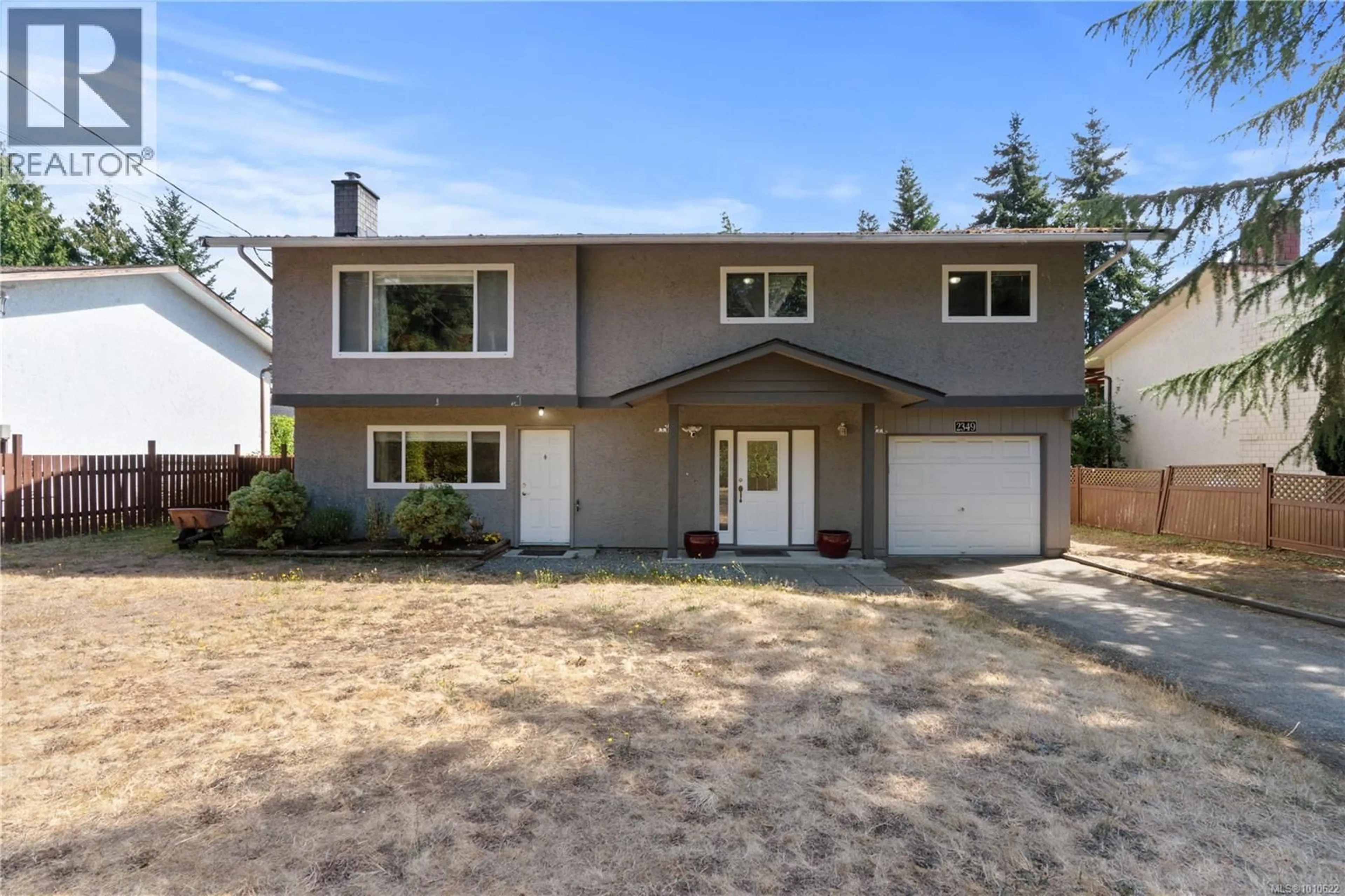 Home with vinyl exterior material, street for 2349 OTTER POINT ROAD, Sooke British Columbia V9Z0H9