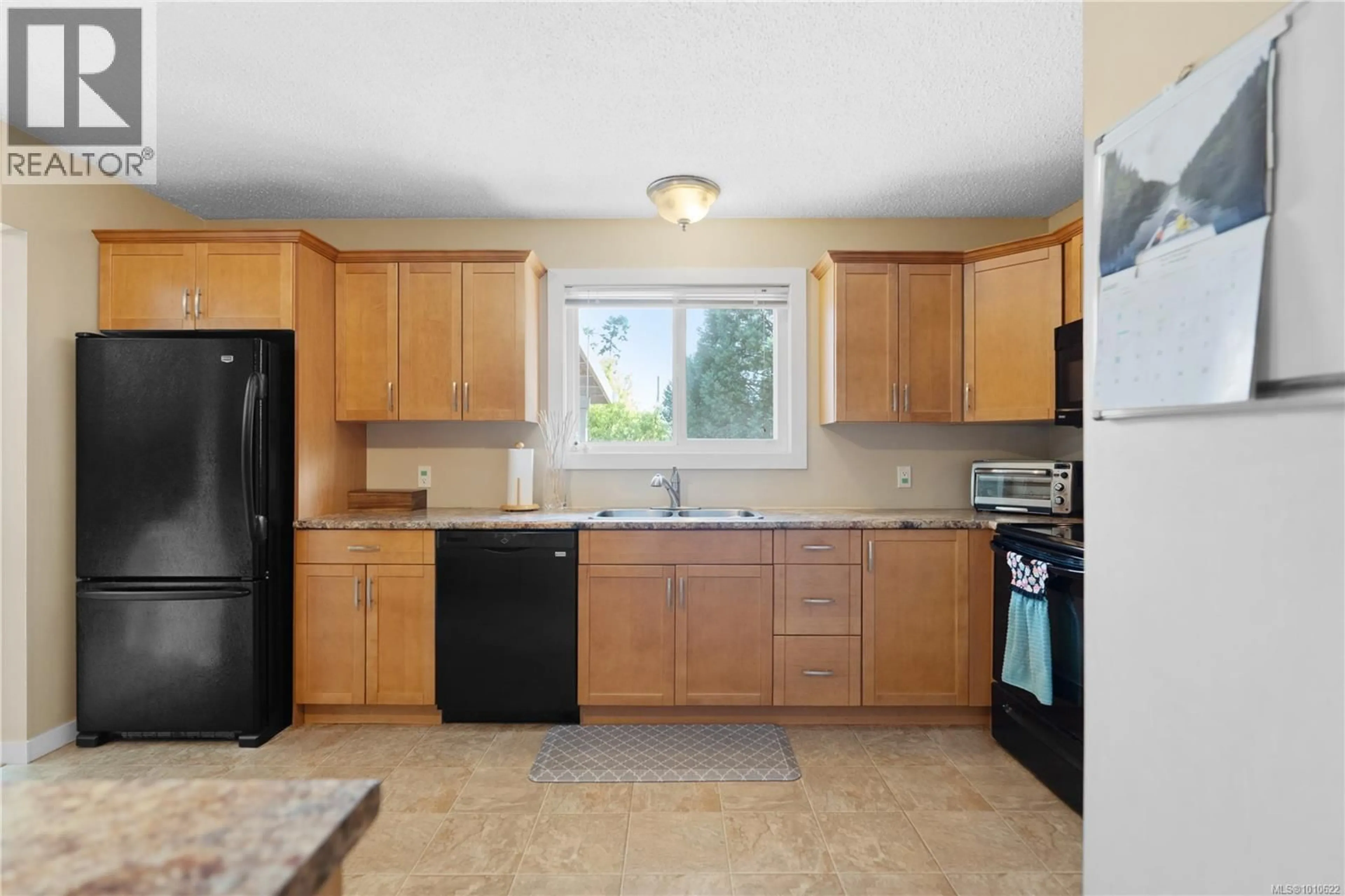 Standard kitchen, ceramic/tile floor for 2349 OTTER POINT ROAD, Sooke British Columbia V9Z0H9
