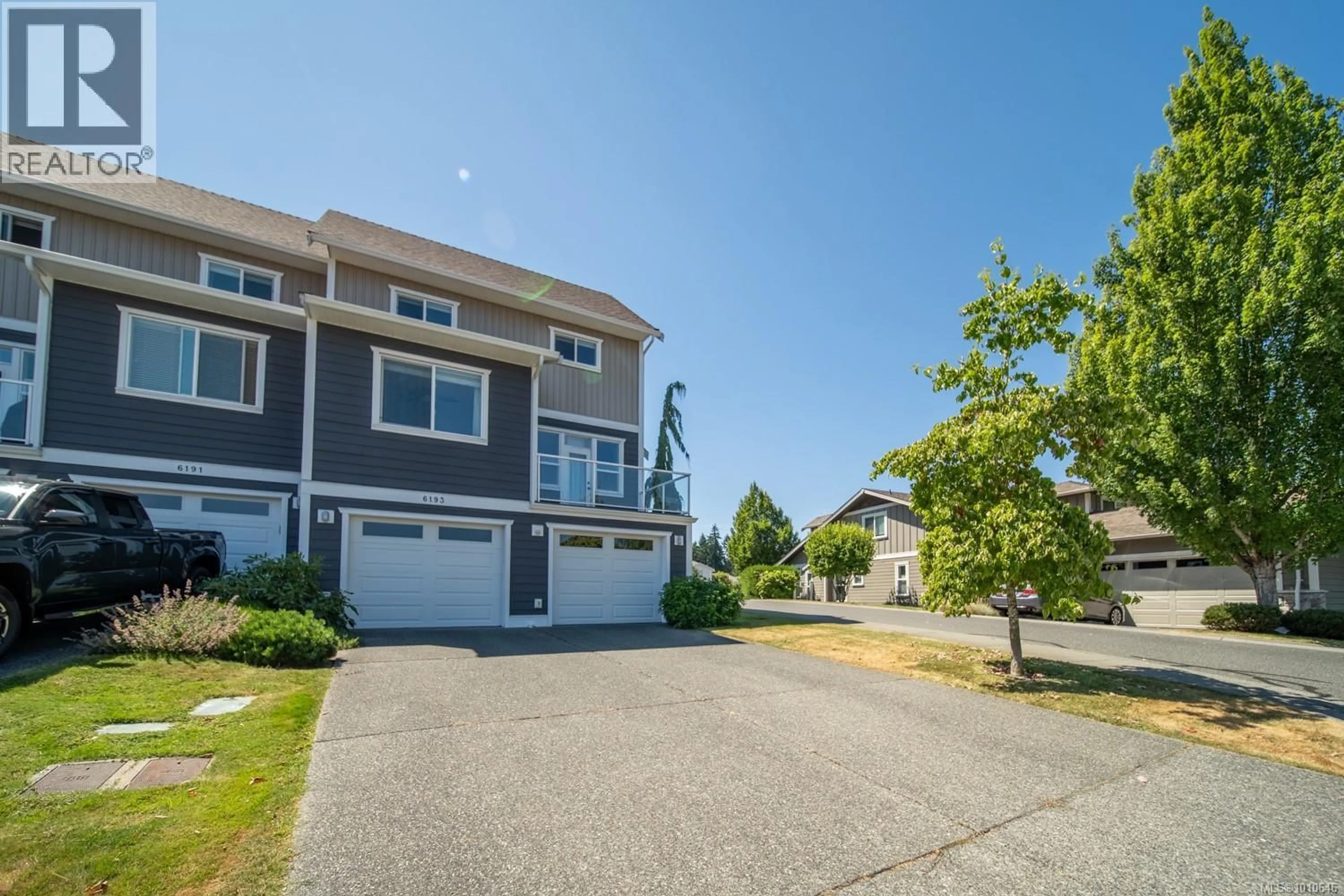 A pic from outside/outdoor area/front of a property/back of a property/a pic from drone, street for 6193 WASHINGTON WAY, Nanaimo British Columbia V9T0A2