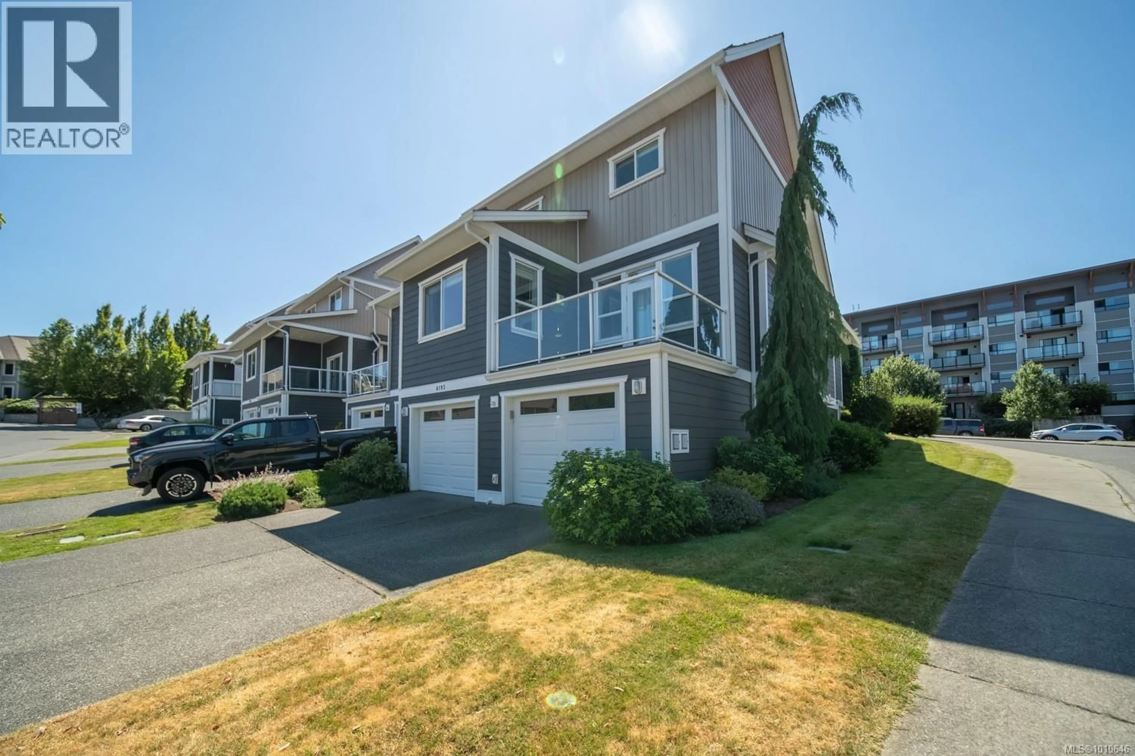 A pic from outside/outdoor area/front of a property/back of a property/a pic from drone, street for 6193 WASHINGTON WAY, Nanaimo British Columbia V9T0A2