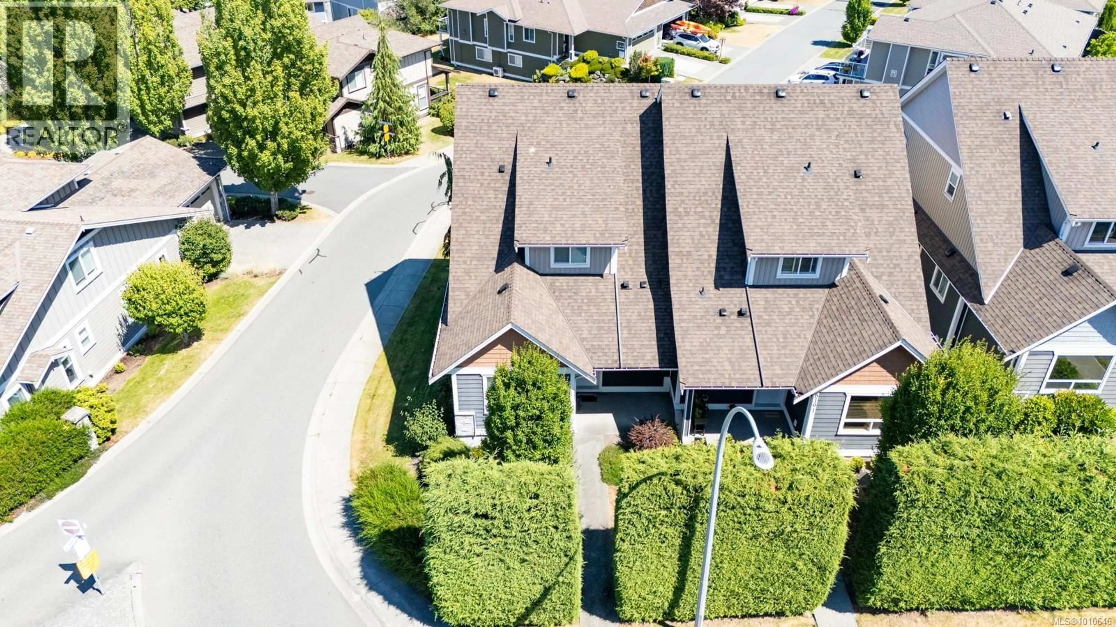 A pic from outside/outdoor area/front of a property/back of a property/a pic from drone, street for 6193 WASHINGTON WAY, Nanaimo British Columbia V9T0A2