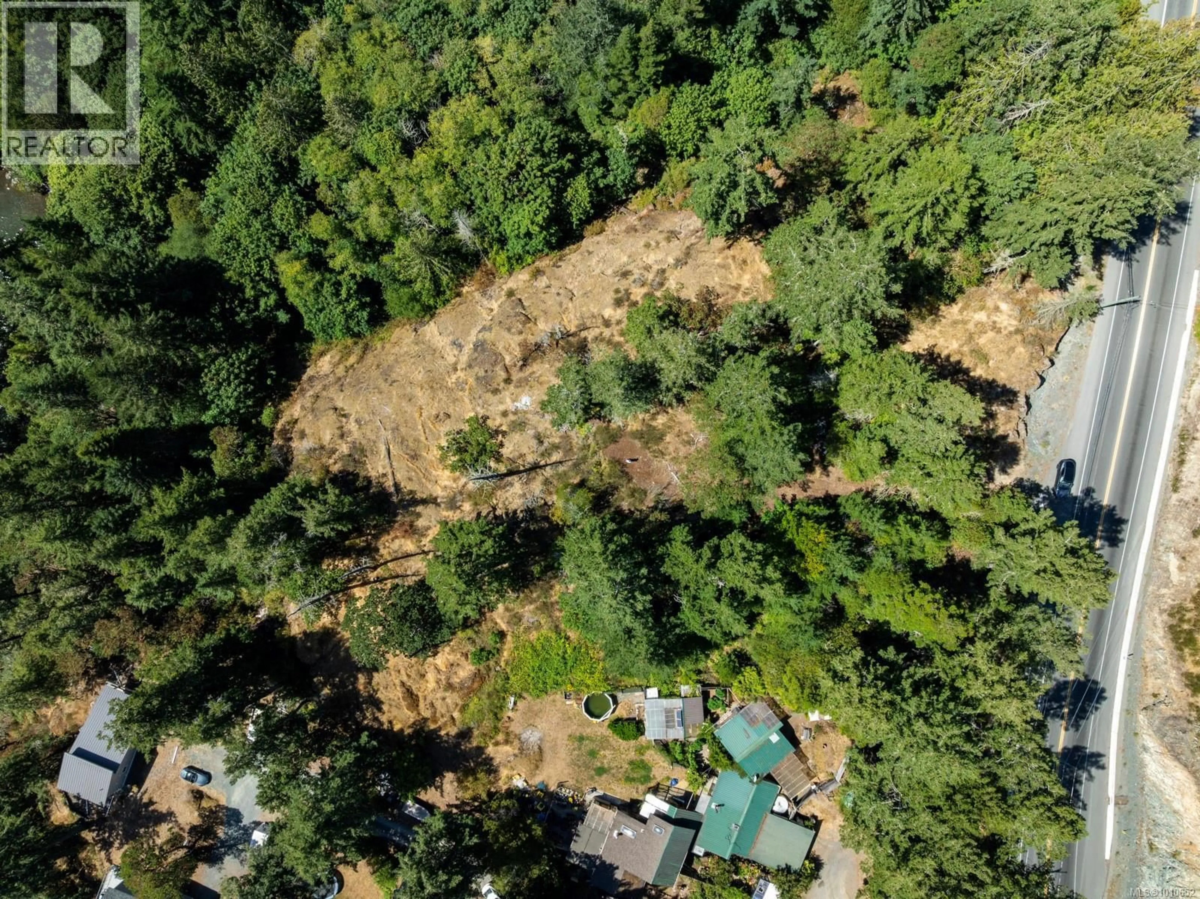 A pic from outside/outdoor area/front of a property/back of a property/a pic from drone, forest/trees view for 5201 SOOKE ROAD, Sooke British Columbia V8V1L9