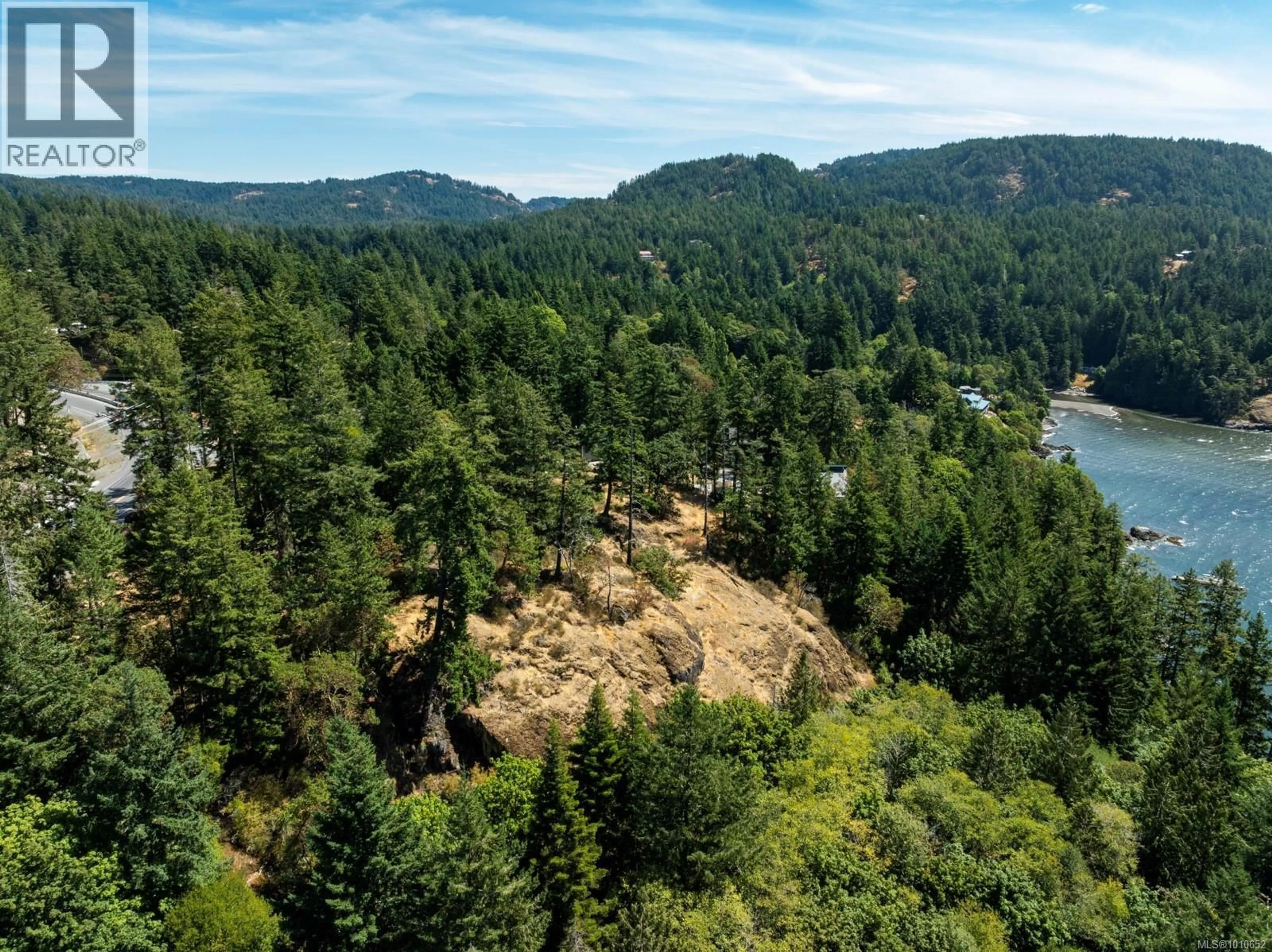 A pic from outside/outdoor area/front of a property/back of a property/a pic from drone, forest/trees view for 5201 SOOKE ROAD, Sooke British Columbia V8V1L9