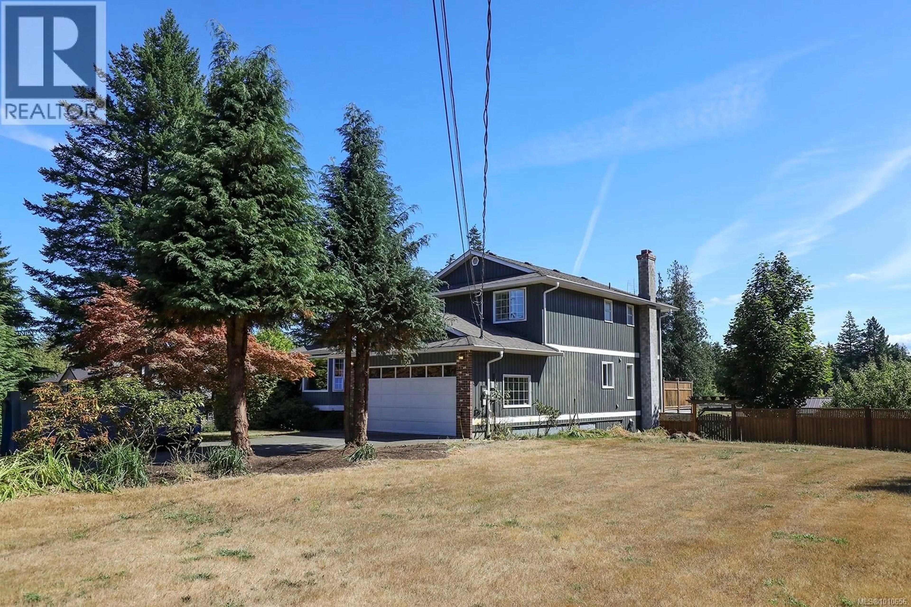 A pic from outside/outdoor area/front of a property/back of a property/a pic from drone, unknown for 2099 IDIENS WAY, Comox British Columbia V9M3Y9