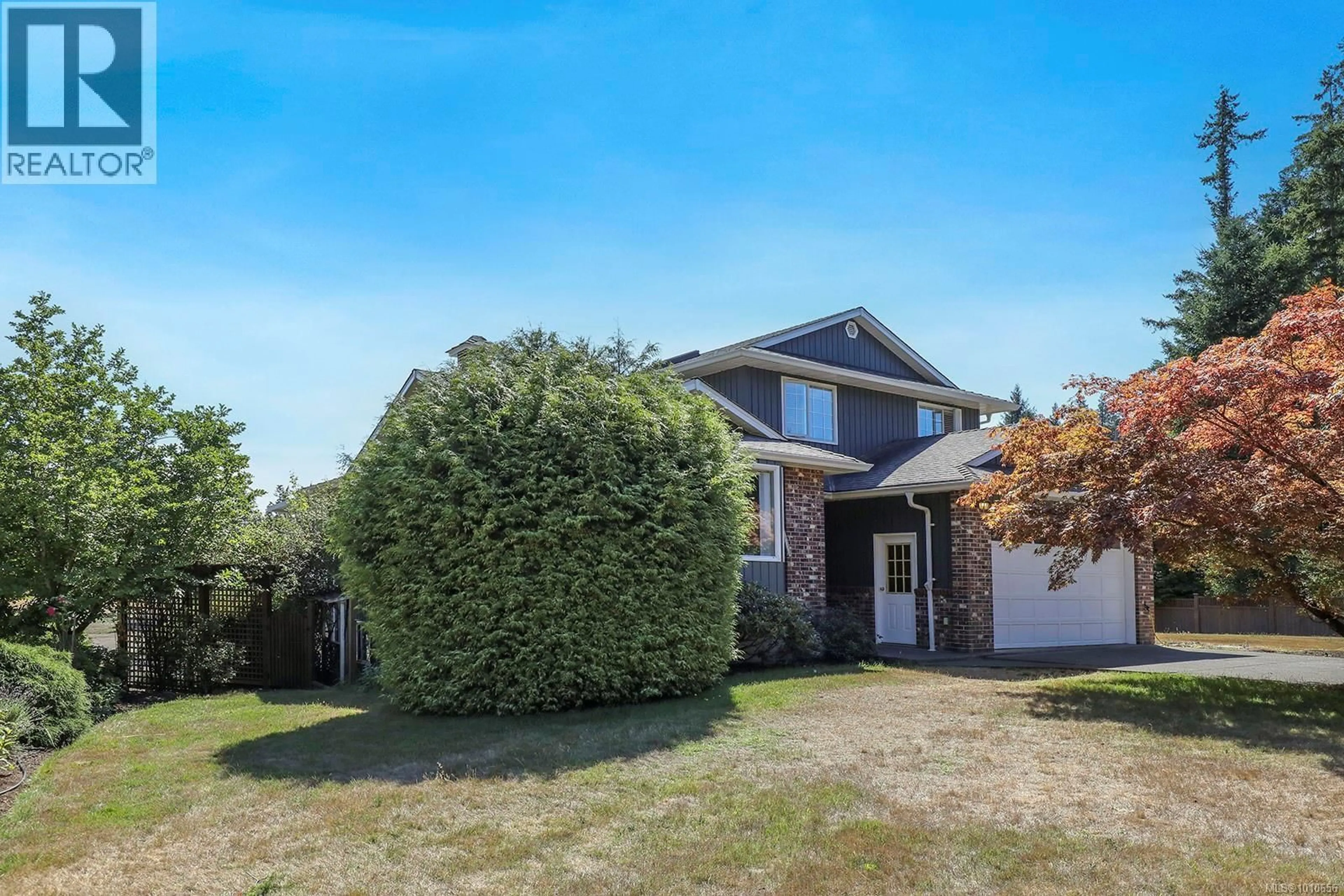 A pic from outside/outdoor area/front of a property/back of a property/a pic from drone, street for 2099 IDIENS WAY, Comox British Columbia V9M3Y9