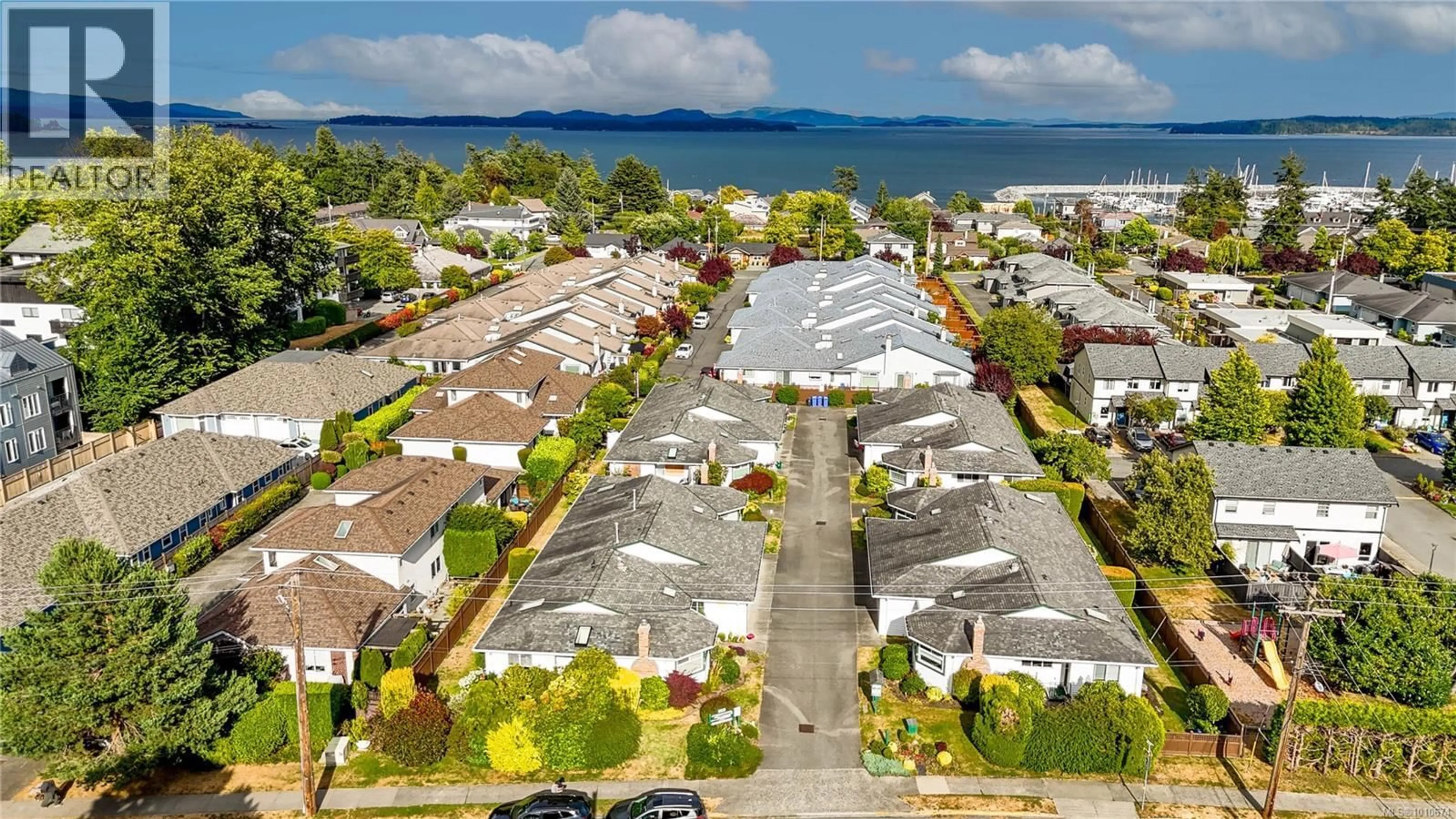 A pic from outside/outdoor area/front of a property/back of a property/a pic from drone, water/lake/river/ocean view for 3 - 10101 FIFTH STREET, Sidney British Columbia V8L2X8