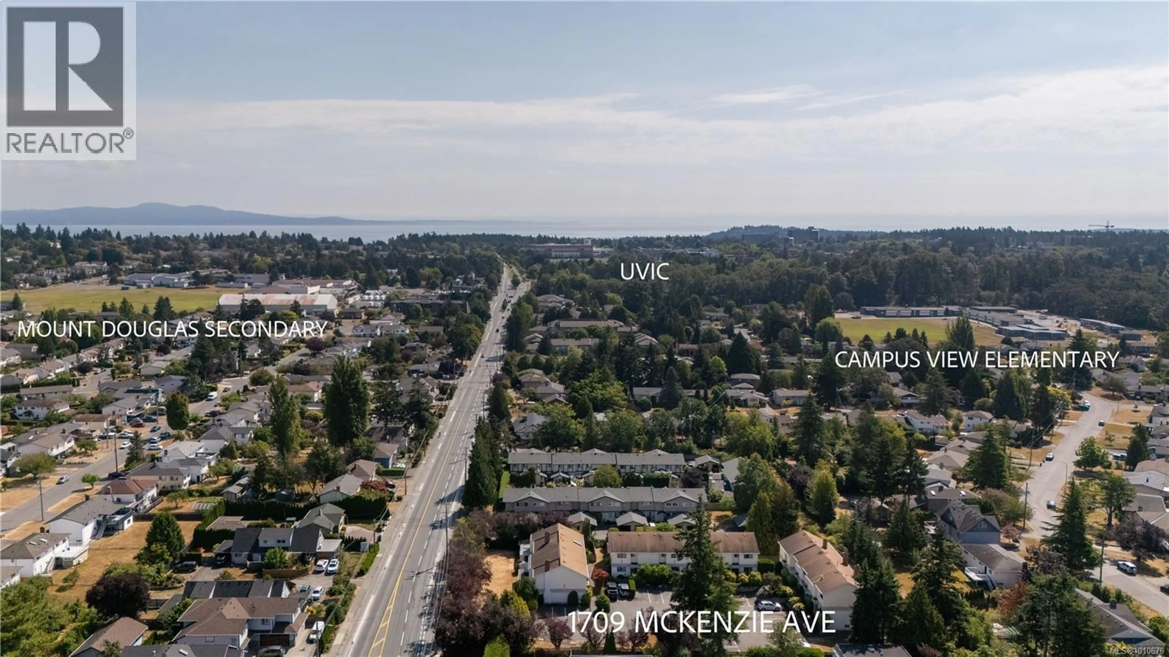 A pic from outside/outdoor area/front of a property/back of a property/a pic from drone, water/lake/river/ocean view for 101 - 1709 MCKENZIE AVENUE, Saanich British Columbia V8N1A6