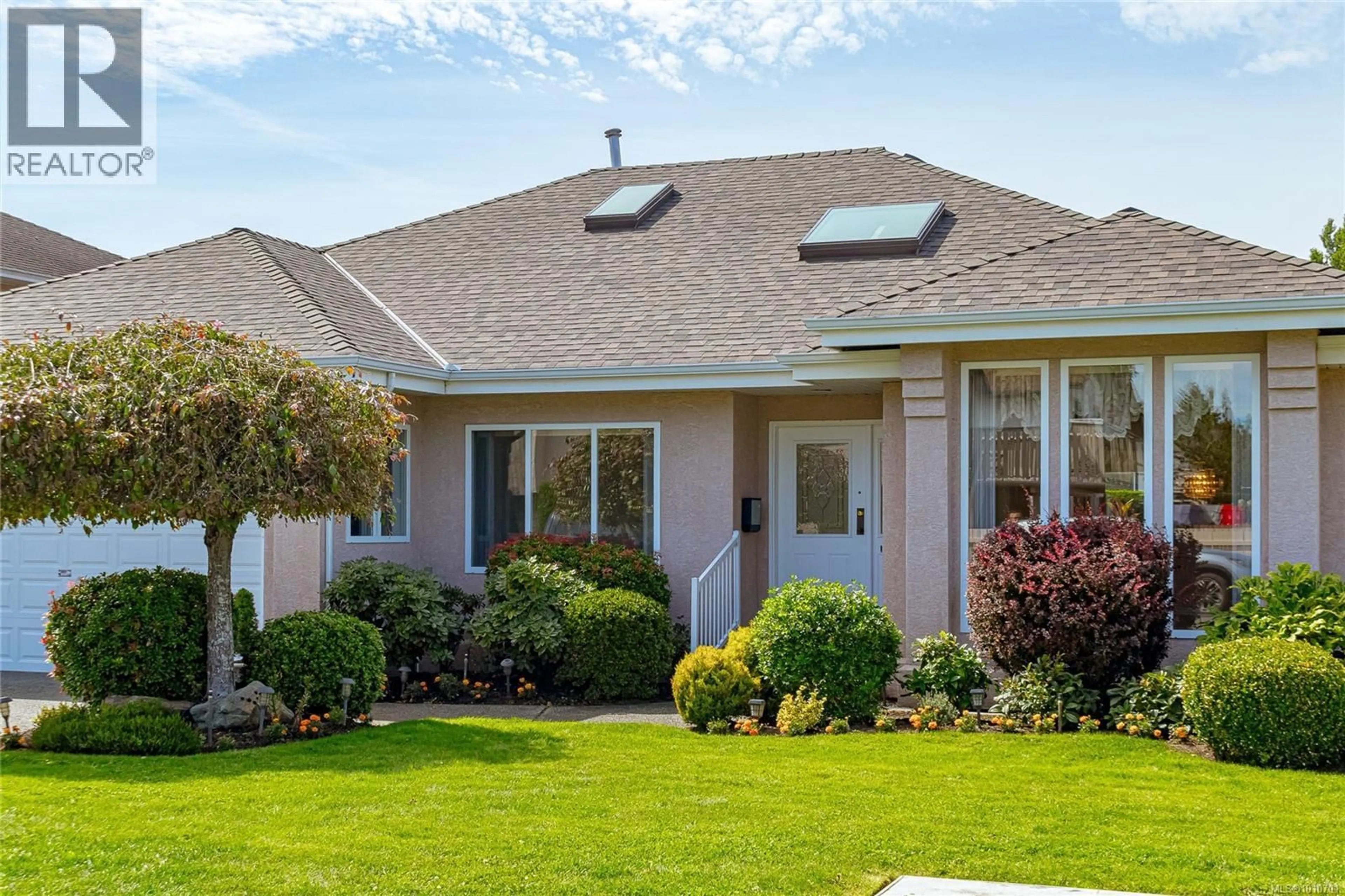 Home with vinyl exterior material, street for 4302 INDIGO LANE, Saanich British Columbia V8N6L1
