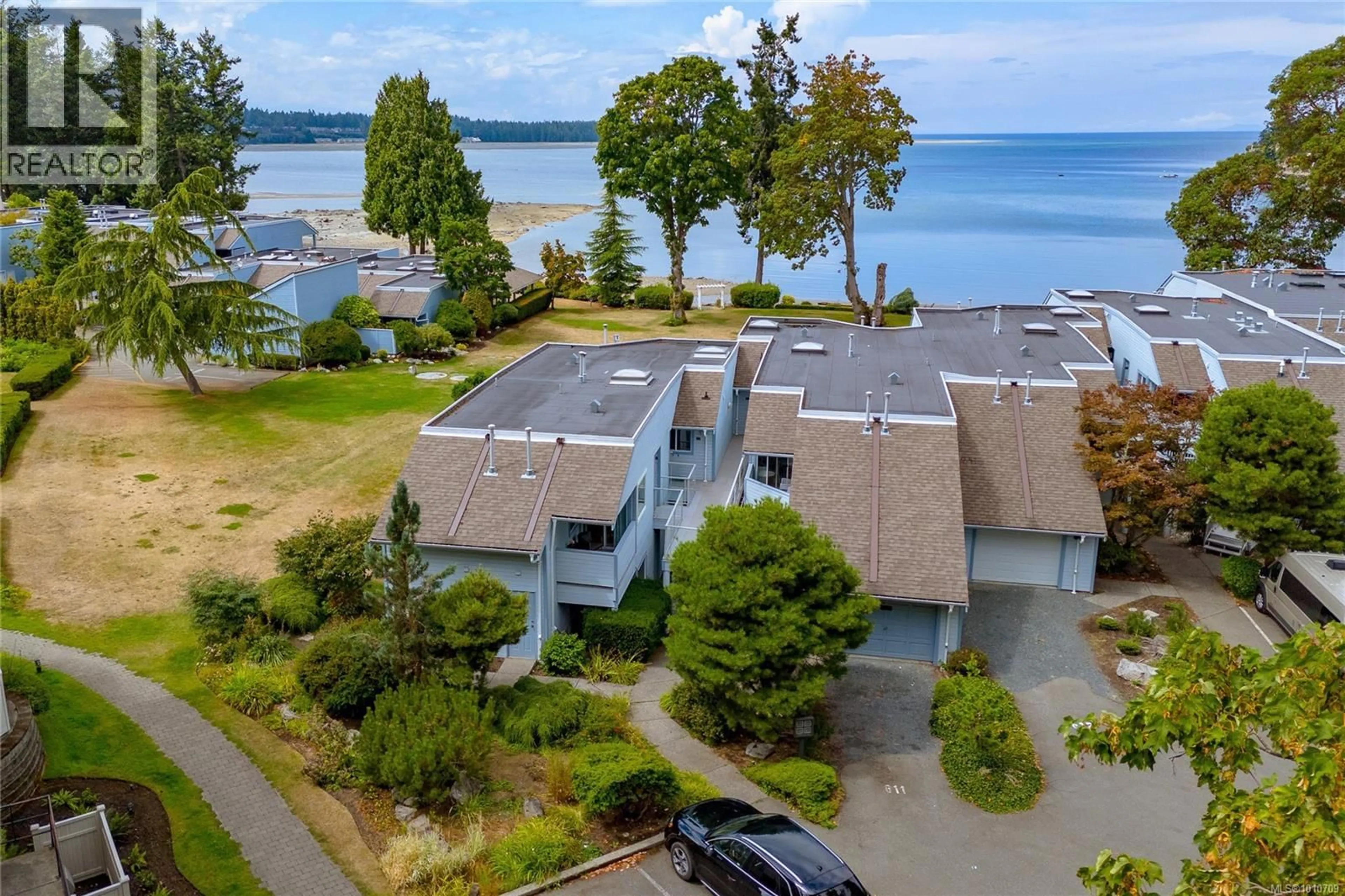 A pic from outside/outdoor area/front of a property/back of a property/a pic from drone, water/lake/river/ocean view for 610 - 1600 STROULGER ROAD, Nanoose Bay British Columbia V9P9B7