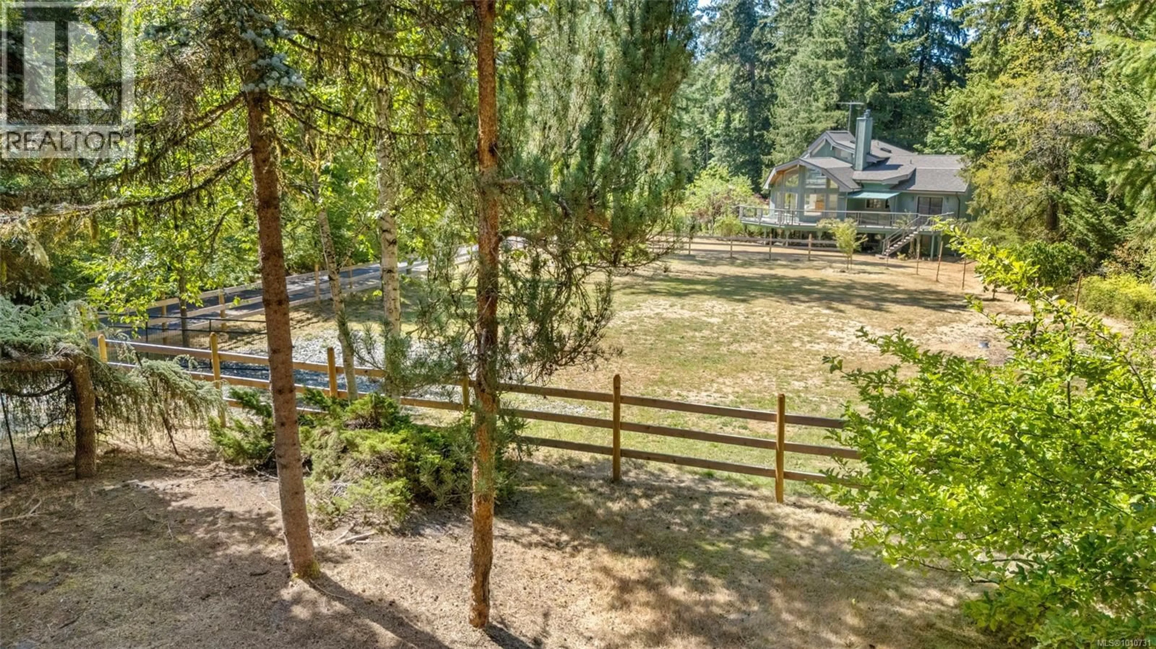 A pic from outside/outdoor area/front of a property/back of a property/a pic from drone, forest/trees view for 4786 HILLBANK ROAD, Cowichan Bay British Columbia V0R1N1