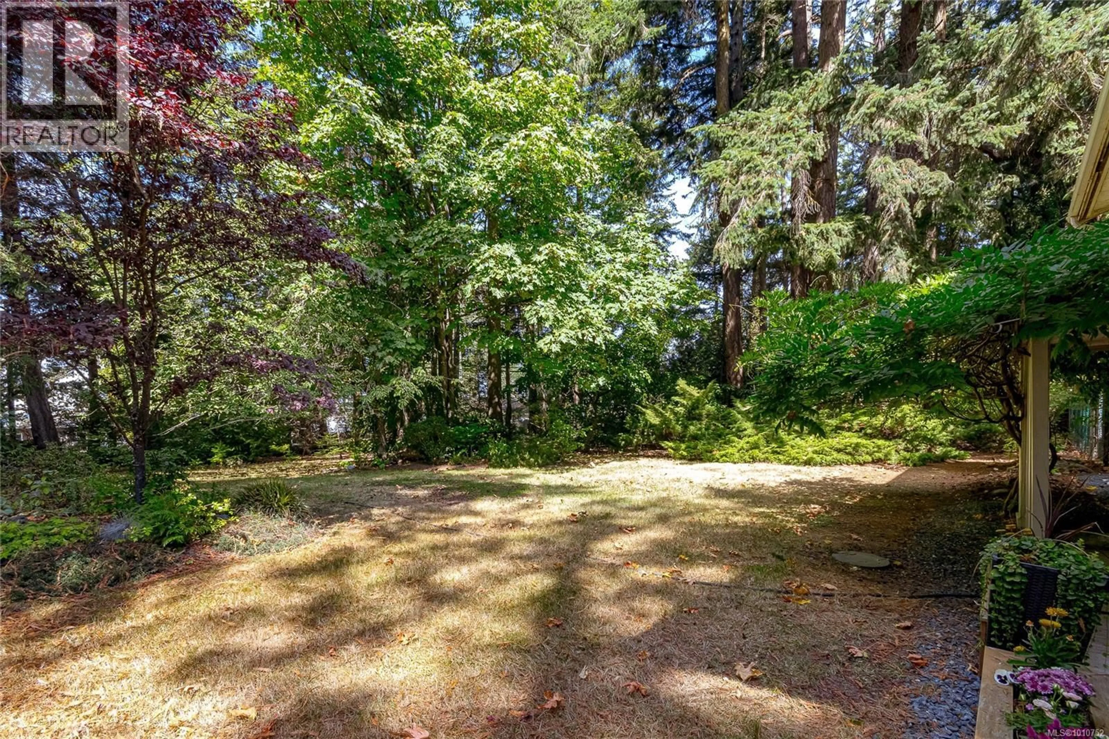 A pic from outside/outdoor area/front of a property/back of a property/a pic from drone, forest/trees view for 589 WOOTTON ROAD, Metchosin British Columbia V9C3Z4