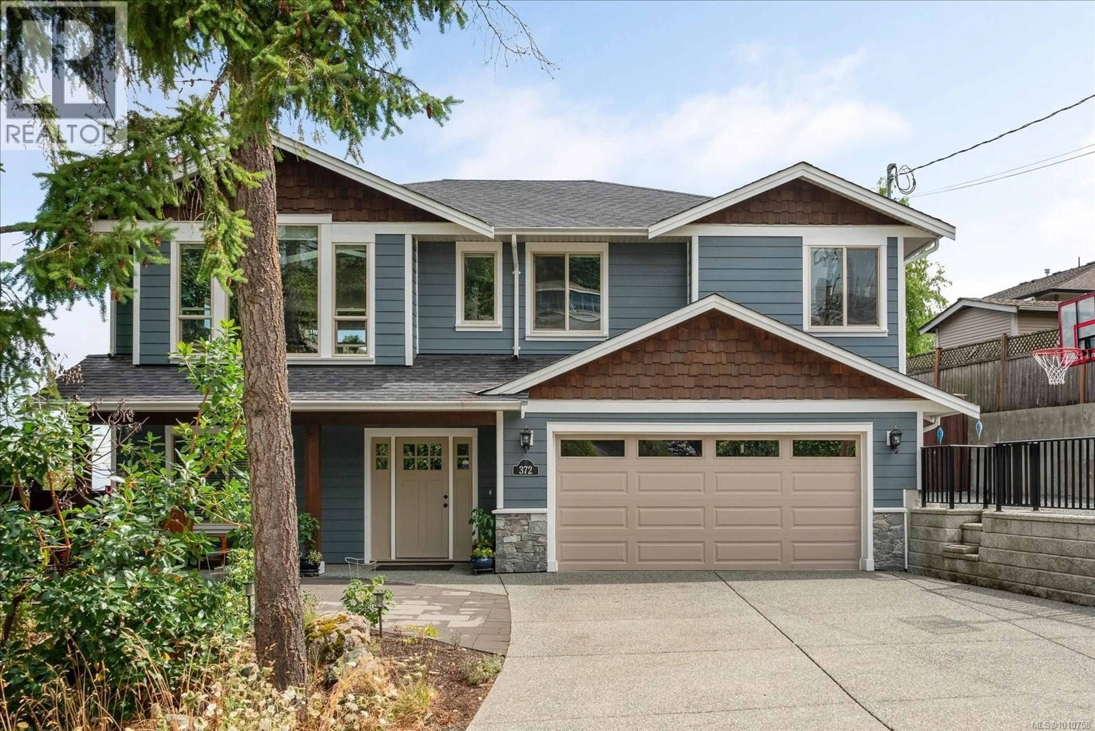 Home with vinyl exterior material, street for 372 CARIBOO DRIVE, Nanaimo British Columbia V9R7E1