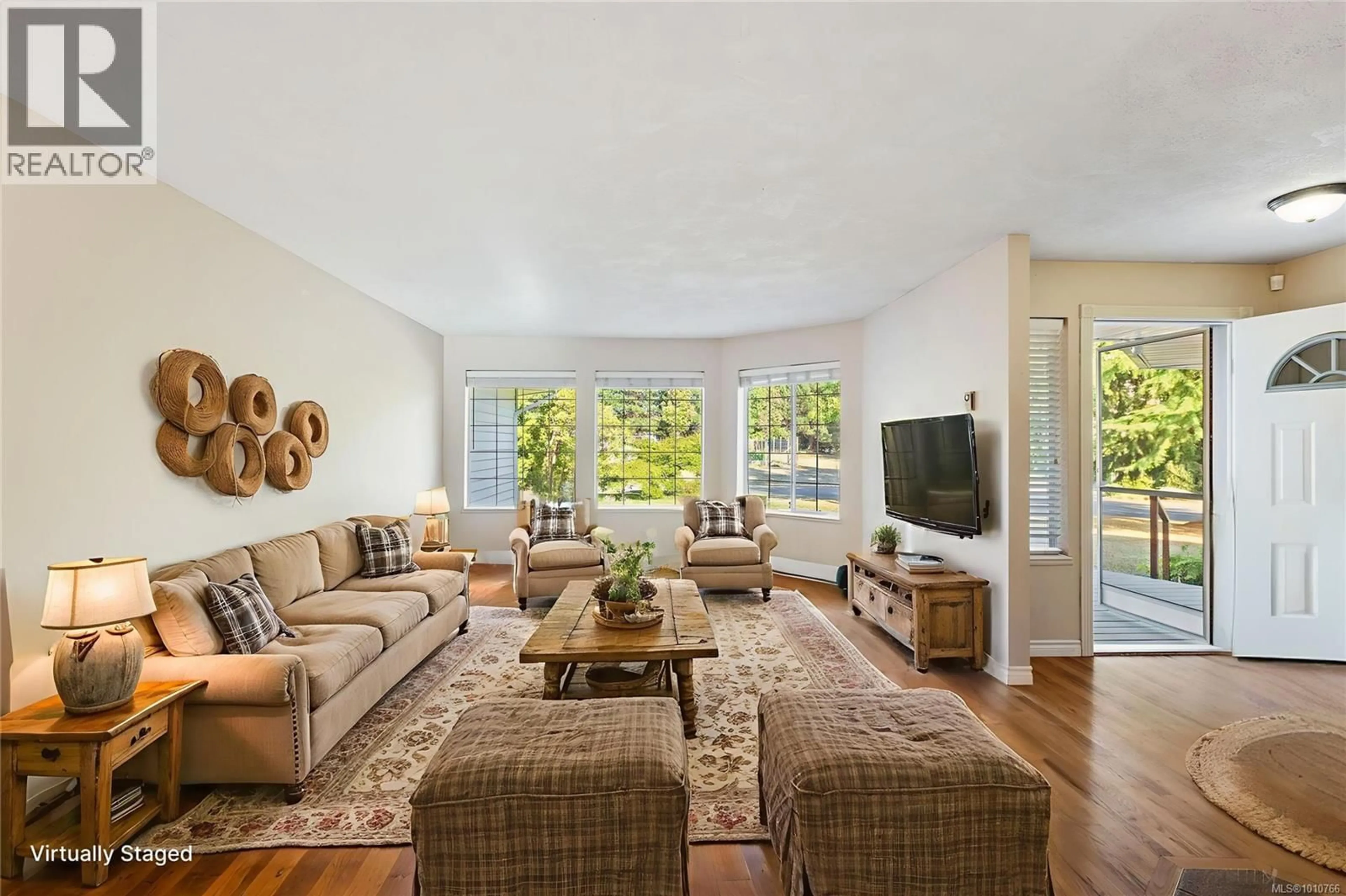 Living room with furniture, unknown for 1184 LUCILLE DRIVE, Central Saanich British Columbia V8M1H6