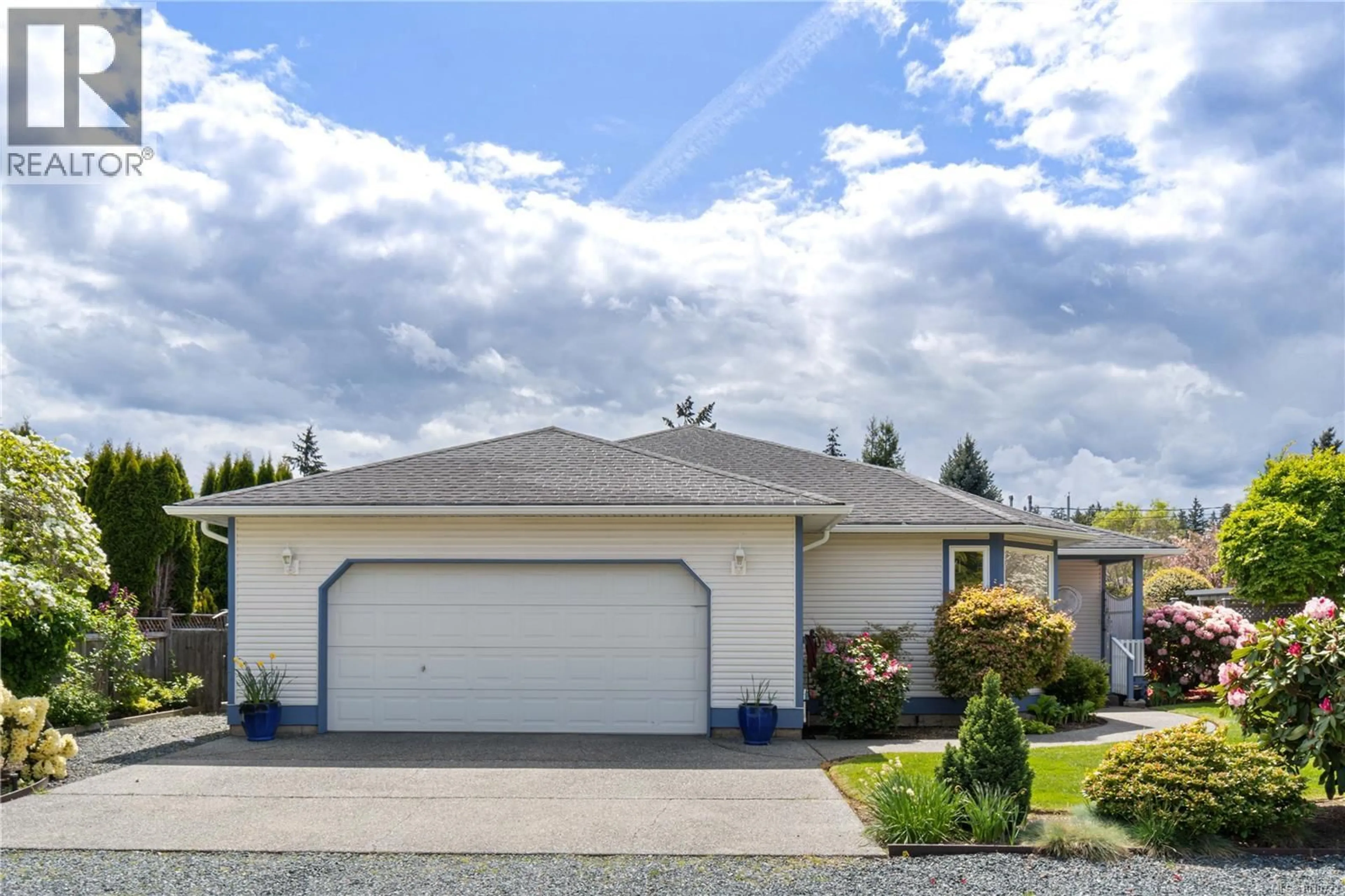 Home with vinyl exterior material, street for 785 NICOLLS DRIVE, Parksville British Columbia V9P1W9