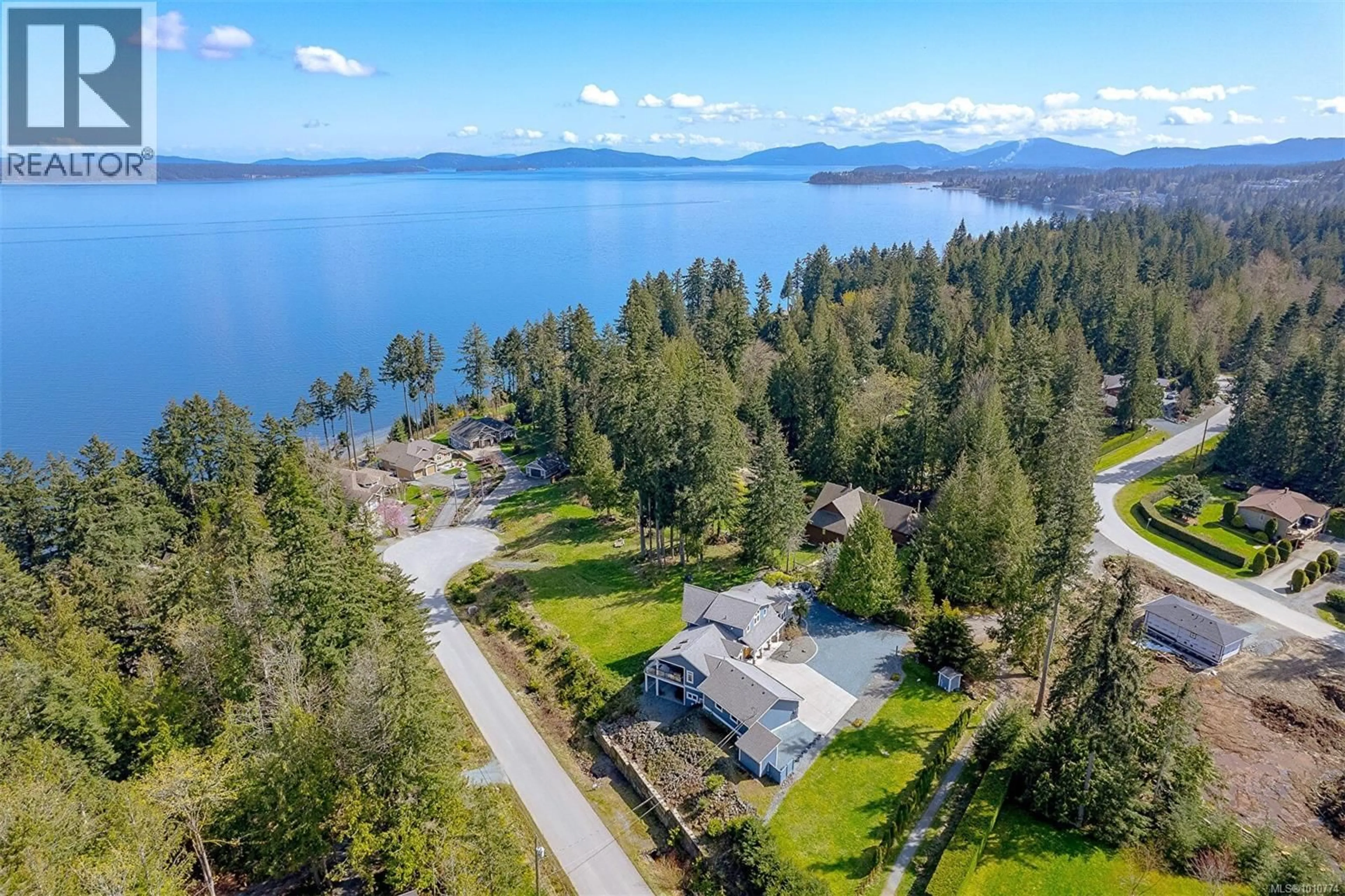 A pic from outside/outdoor area/front of a property/back of a property/a pic from drone, water/lake/river/ocean view for 10801 GUILBRIDE DRIVE, Saltair British Columbia V9G2B3