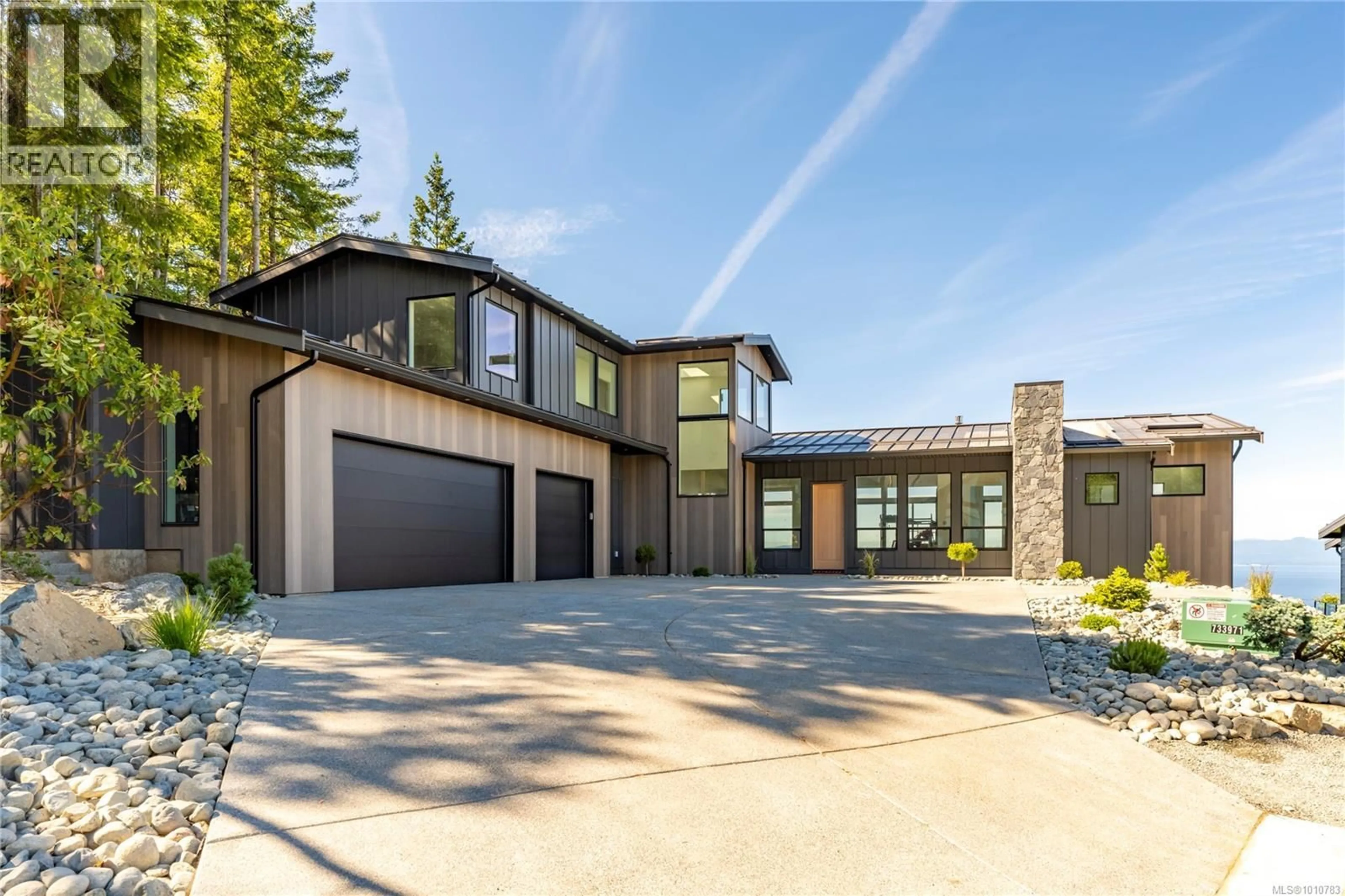 Home with brick exterior material, street for 7546 TONNERRE WAY, Lantzville British Columbia V0R2H0
