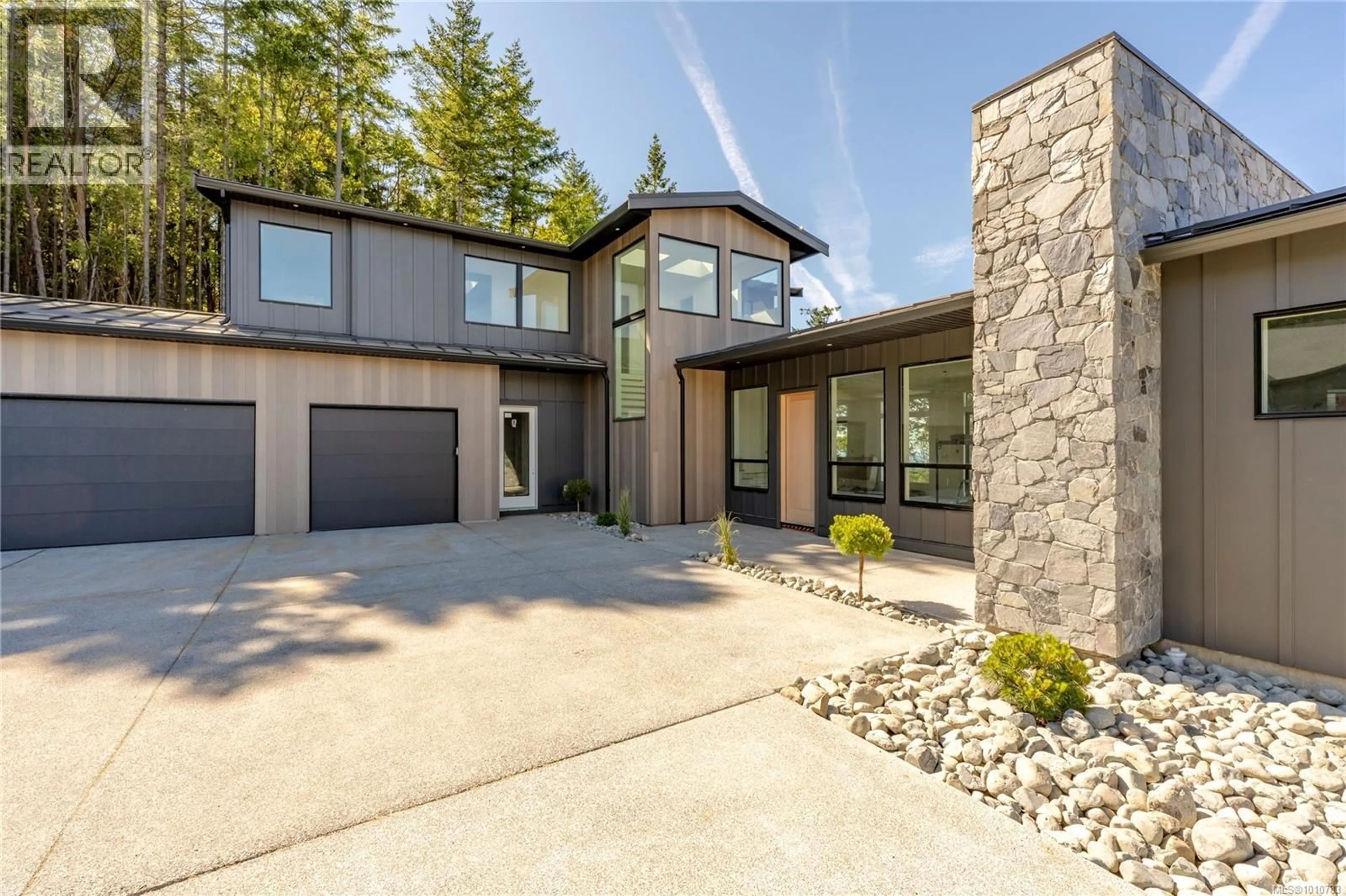 Home with brick exterior material, street for 7546 TONNERRE WAY, Lantzville British Columbia V0R2H0