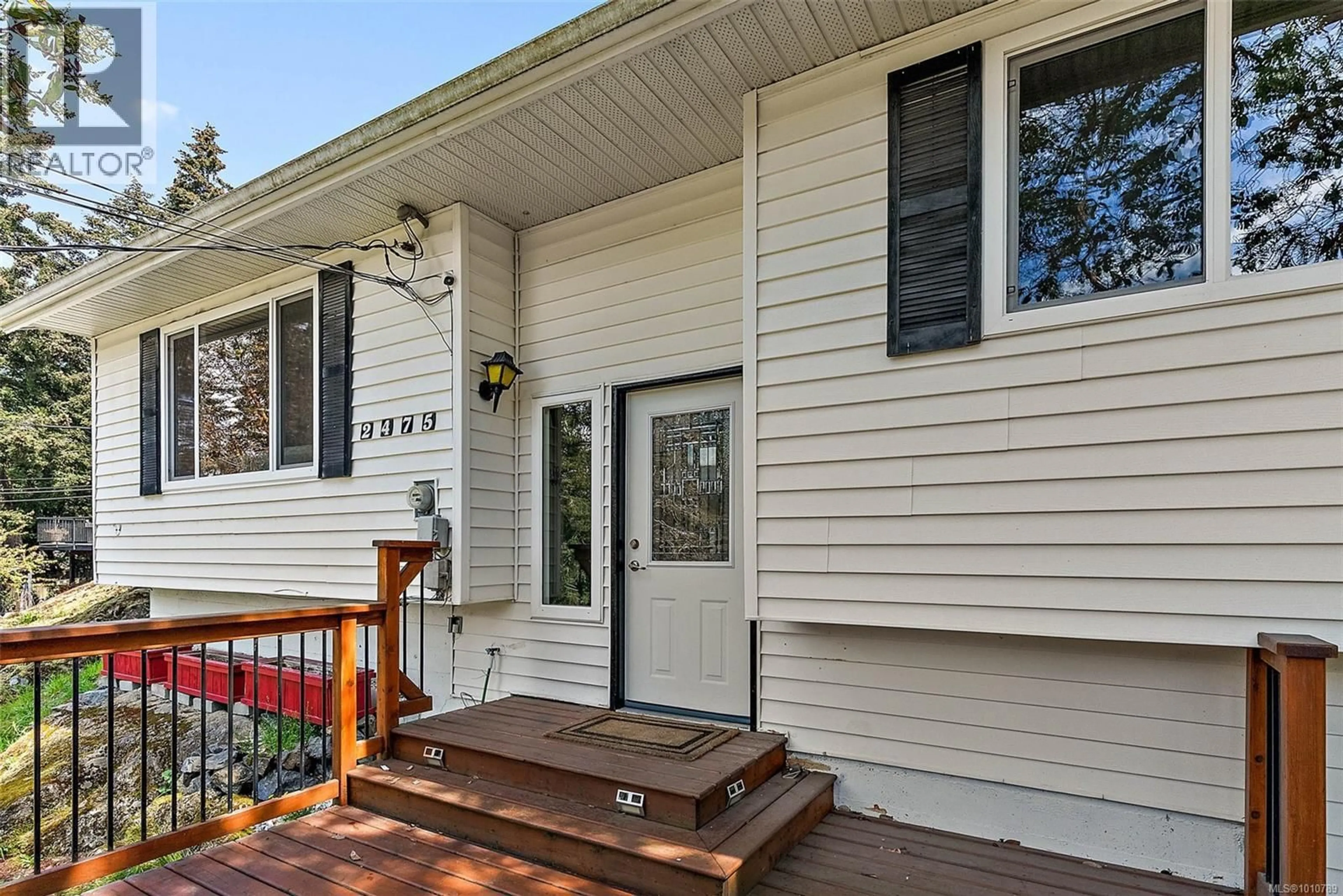 Home with vinyl exterior material, street for 2475 SKEDANS ROAD, Langford British Columbia V9B5H6
