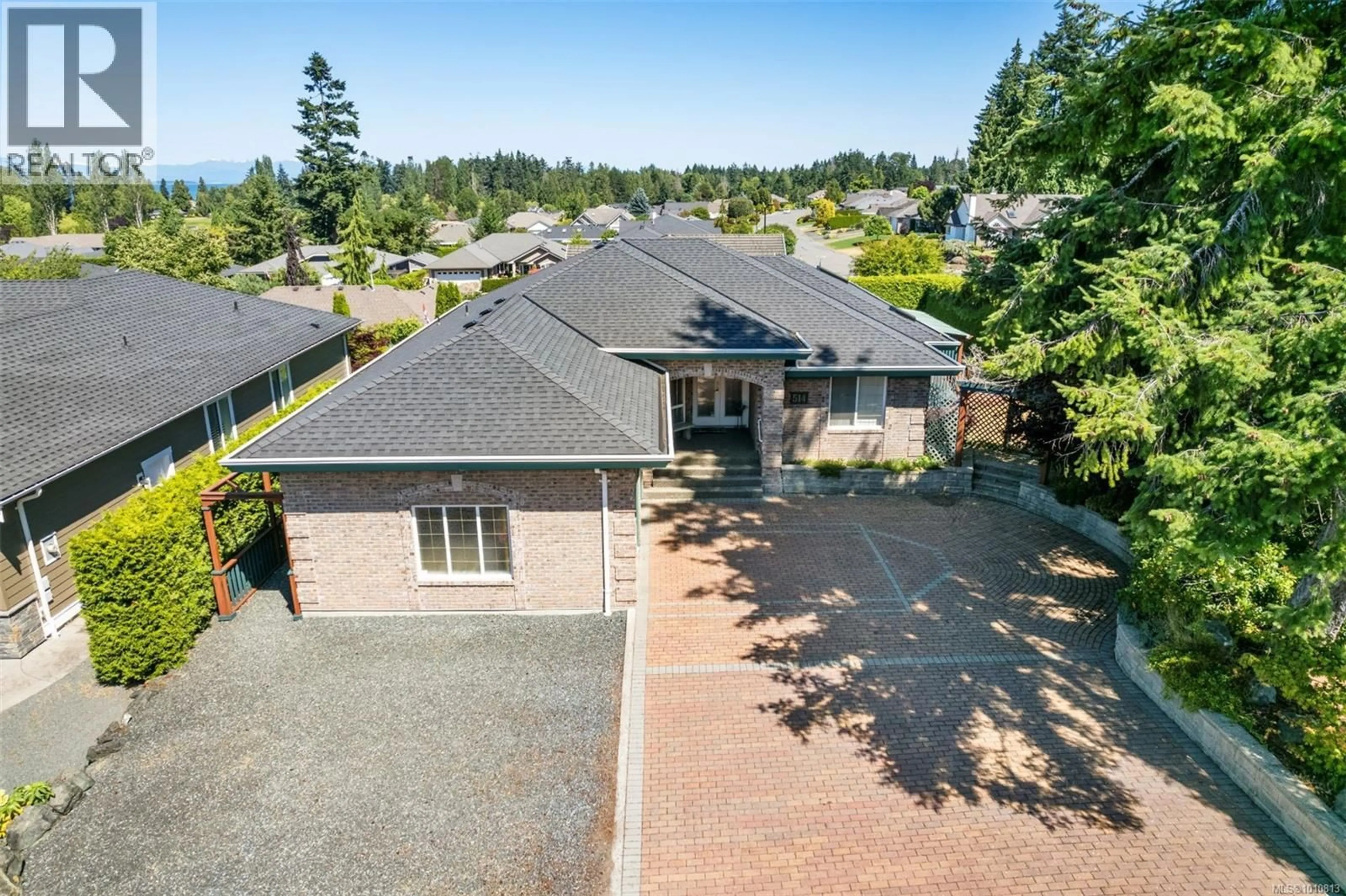 A pic from outside/outdoor area/front of a property/back of a property/a pic from drone, street for 514 COUNTRY CLUB DRIVE, Qualicum Beach British Columbia V9K2J9