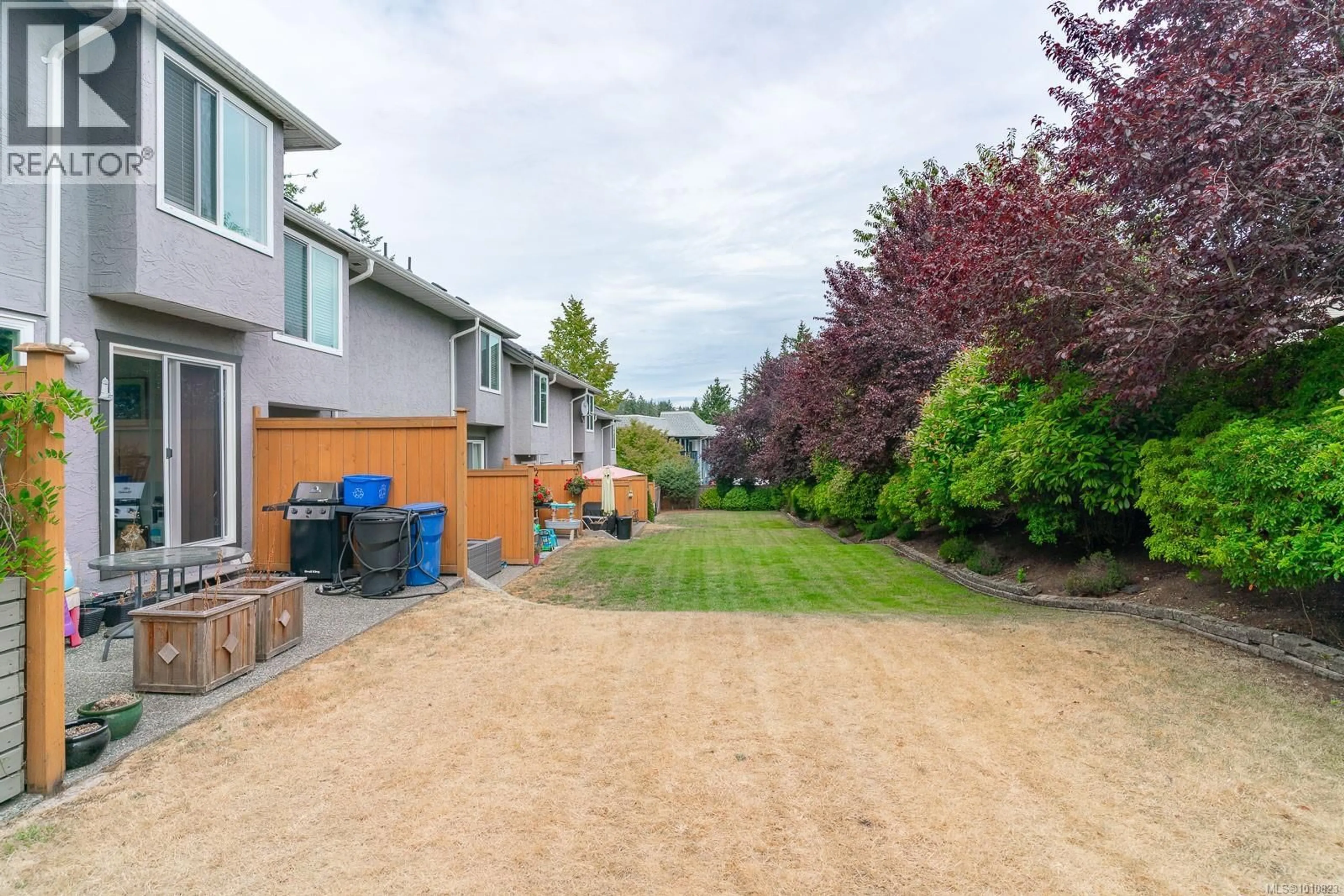 A pic from outside/outdoor area/front of a property/back of a property/a pic from drone, street for 107 - 3070 ROSS ROAD, Nanaimo British Columbia V9T2S4
