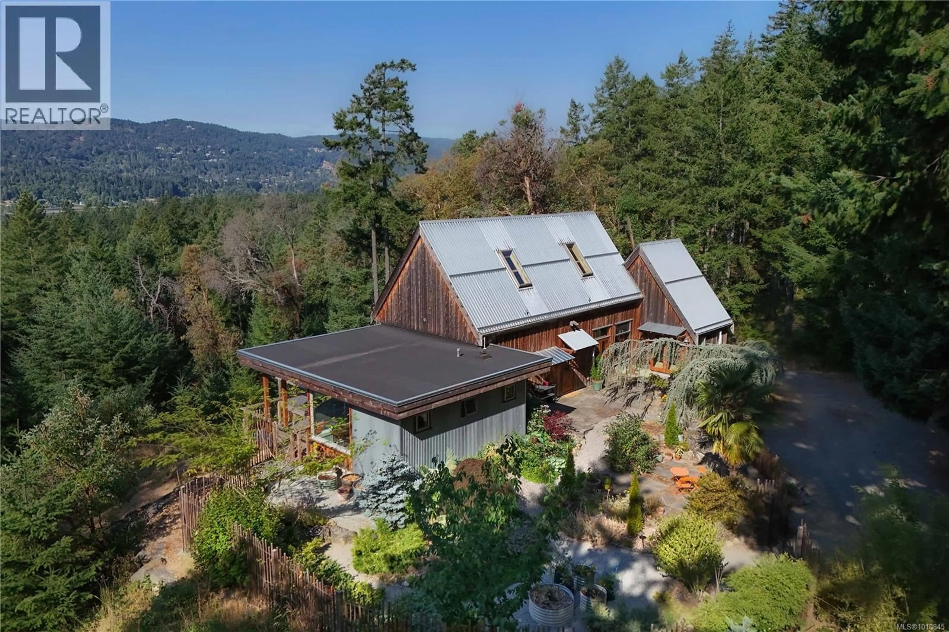 A pic from outside/outdoor area/front of a property/back of a property/a pic from drone, mountain view for 241 LITTLE MOUNTAIN ROAD, Salt Spring British Columbia V8K2L4
