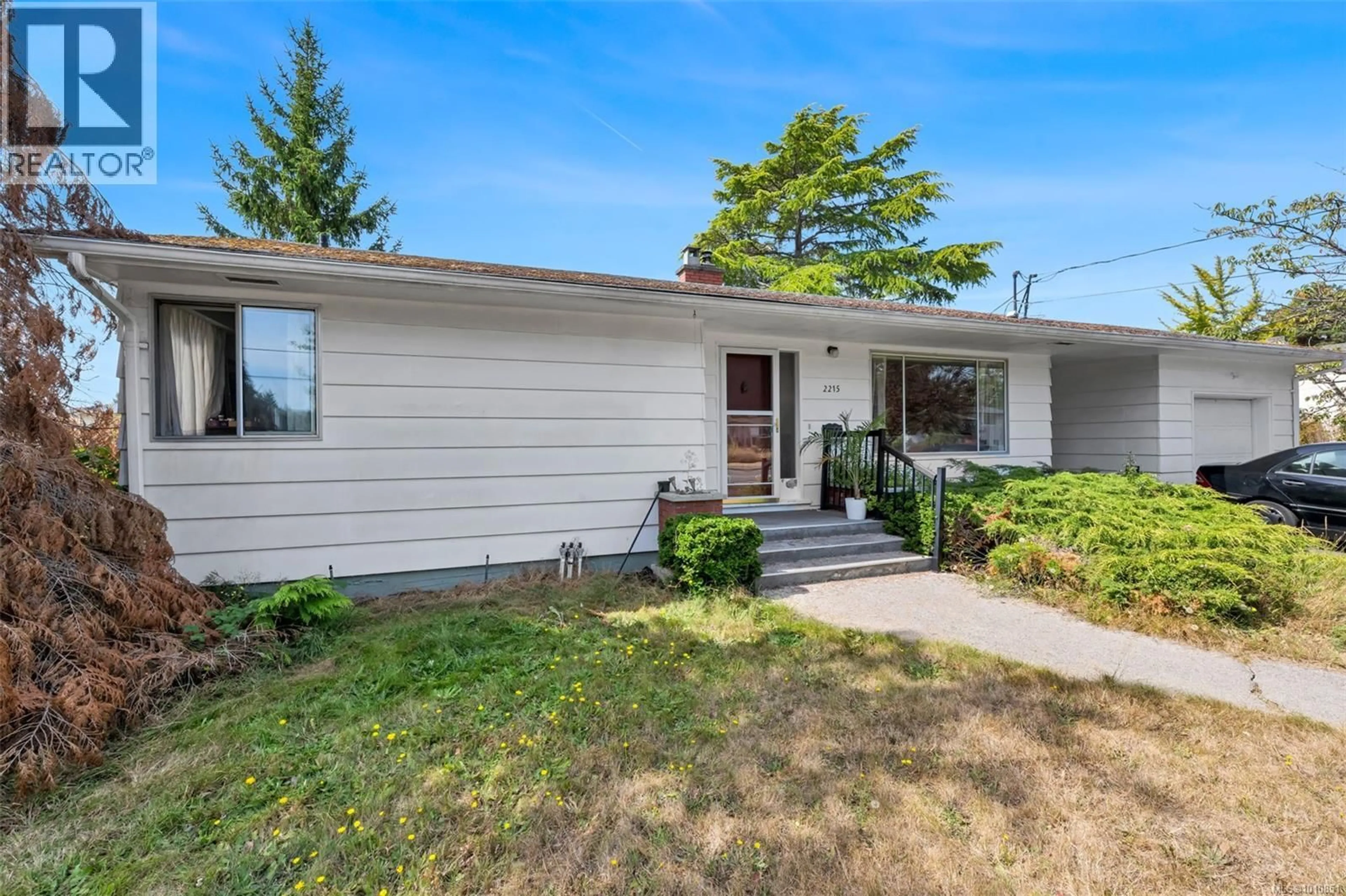 Home with vinyl exterior material, street for 2215 EDGELOW STREET, Saanich British Columbia V8N1R6