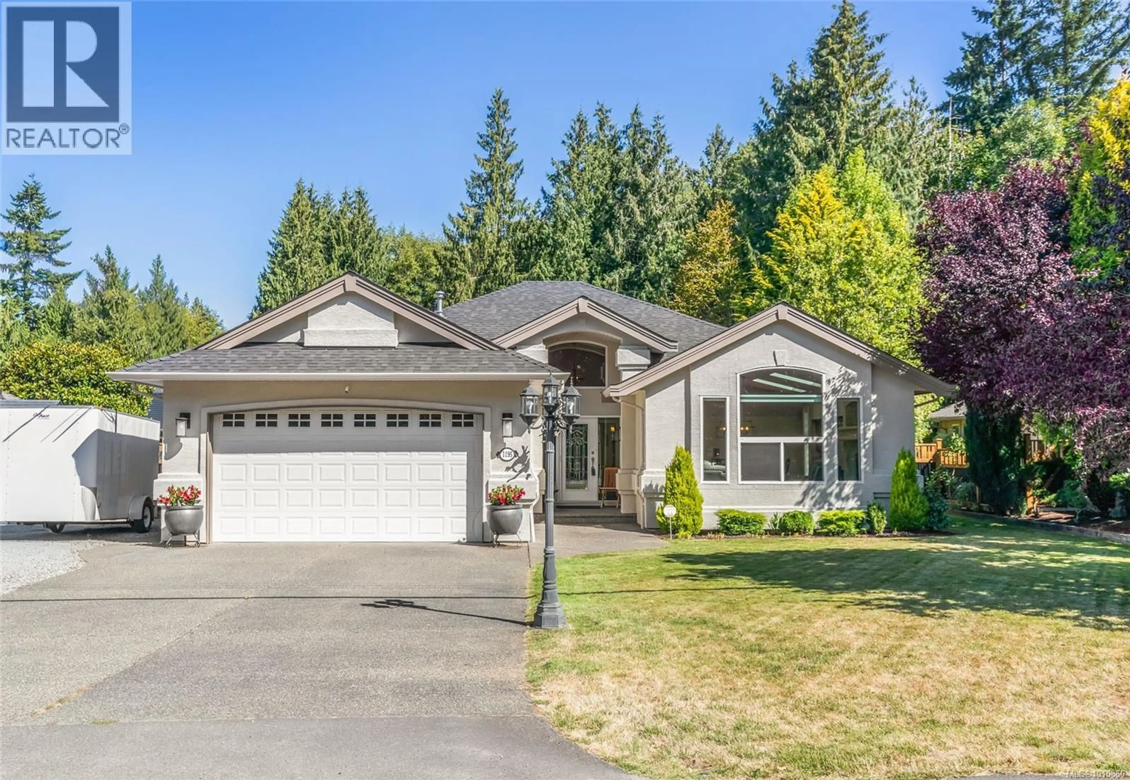 Home with vinyl exterior material, street for 1195 ROBERTON BOULEVARD, French Creek British Columbia V9P2K6